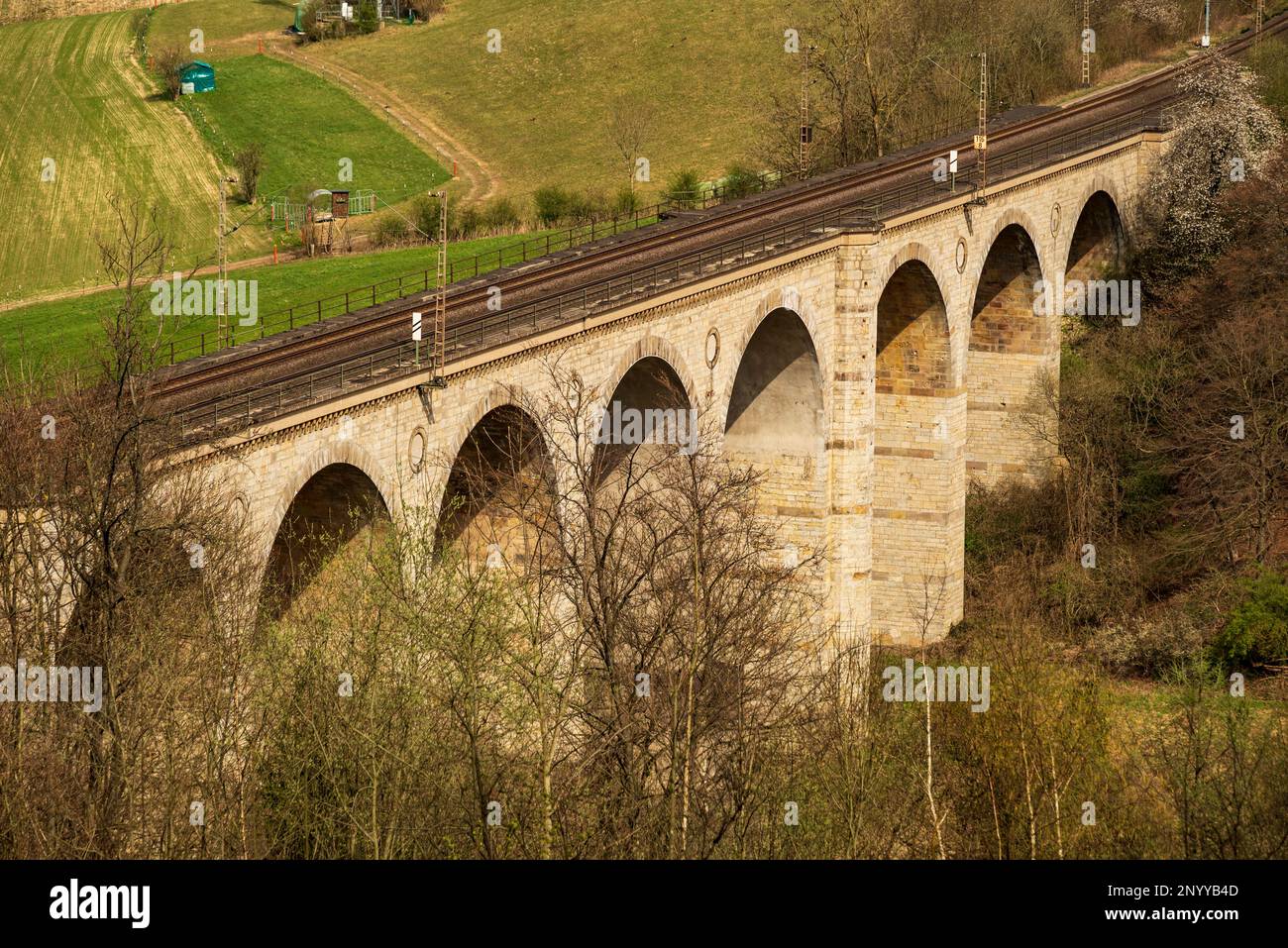 The Altenbeken Viaduct is a 482 meters long and up to 35 meters high double track limestone railway viaduct. Stock Photo