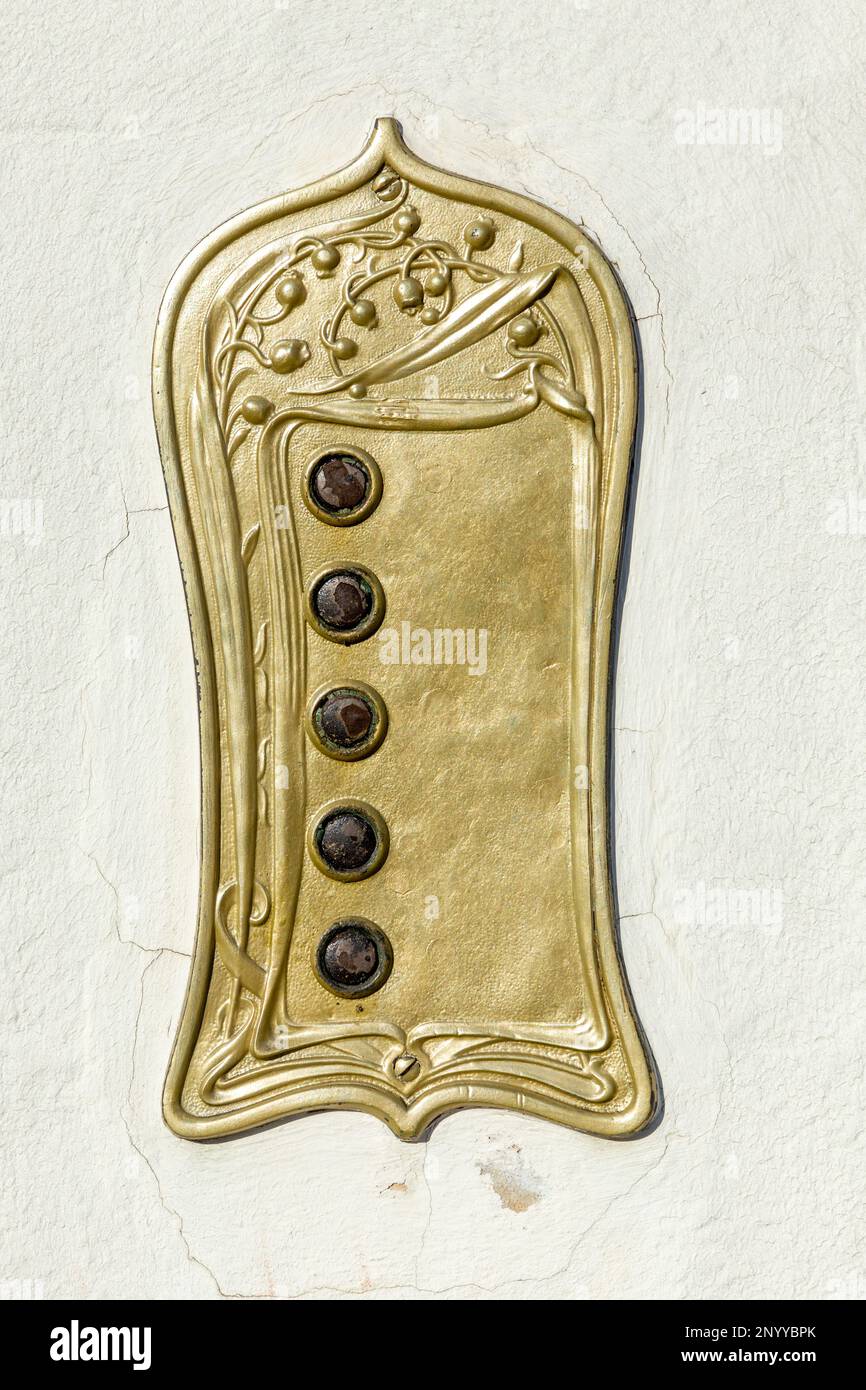 old metal doorbell knob in art nouveau style in detail Stock Photo