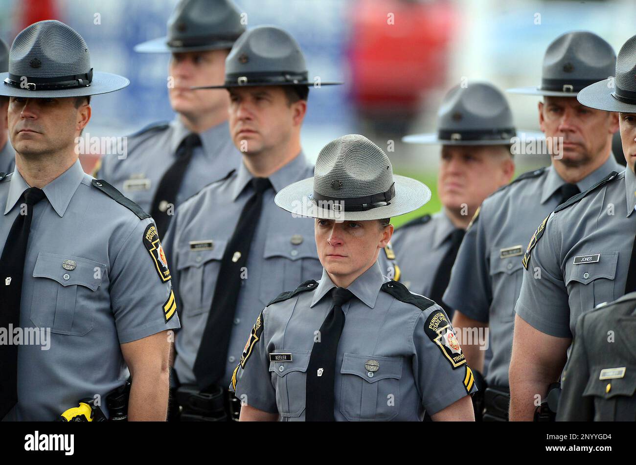 Pennsylvania State Police Troopers stand at attention during an annual