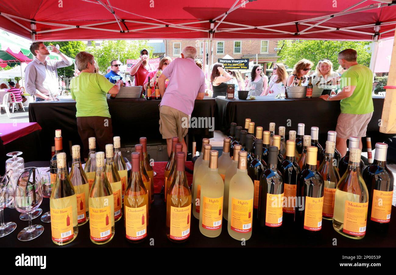 People sample wine from Starburn Winery at the United Bank Bloomin' Wine  Festival on Friday April 28, 2017 in Winchester, Va.. The wine festival,  which continues on Saturday, officially kicked-off the start