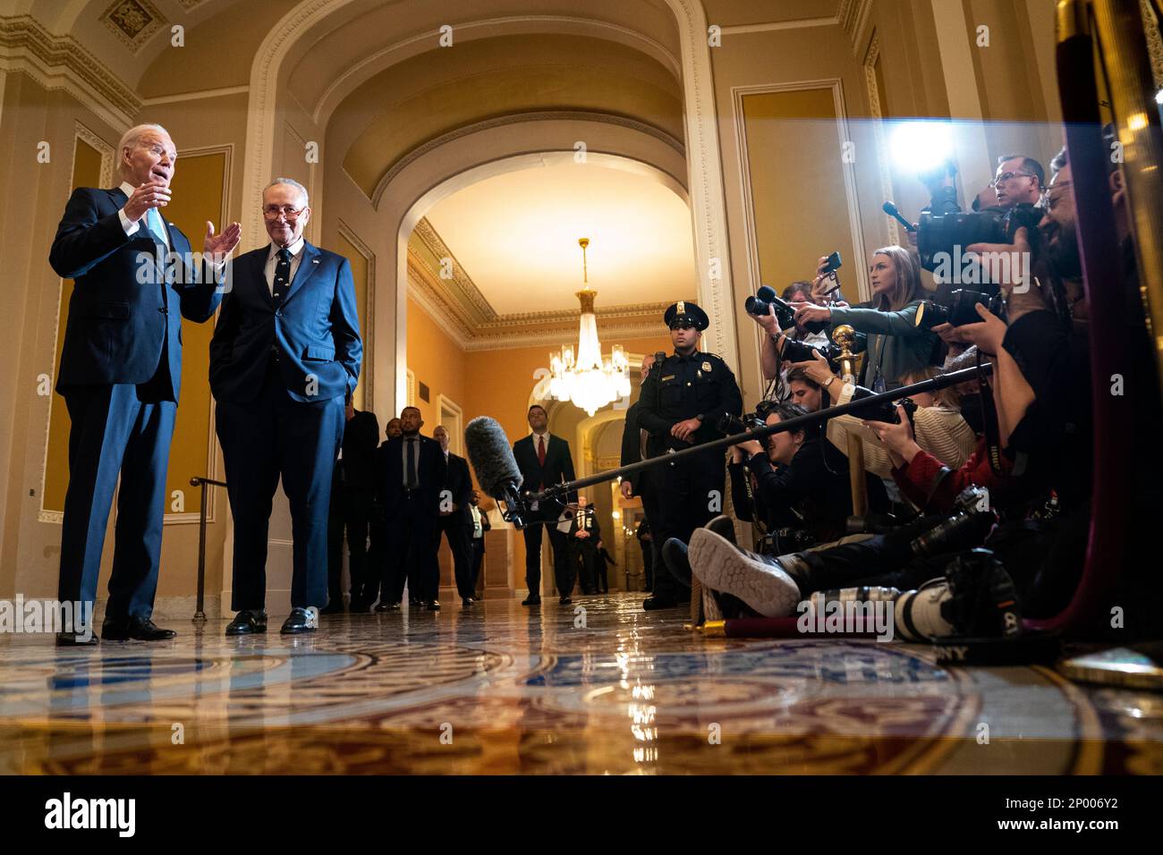 President Joe Biden stands with Senate Majority Leader Chuck Schumer of ...