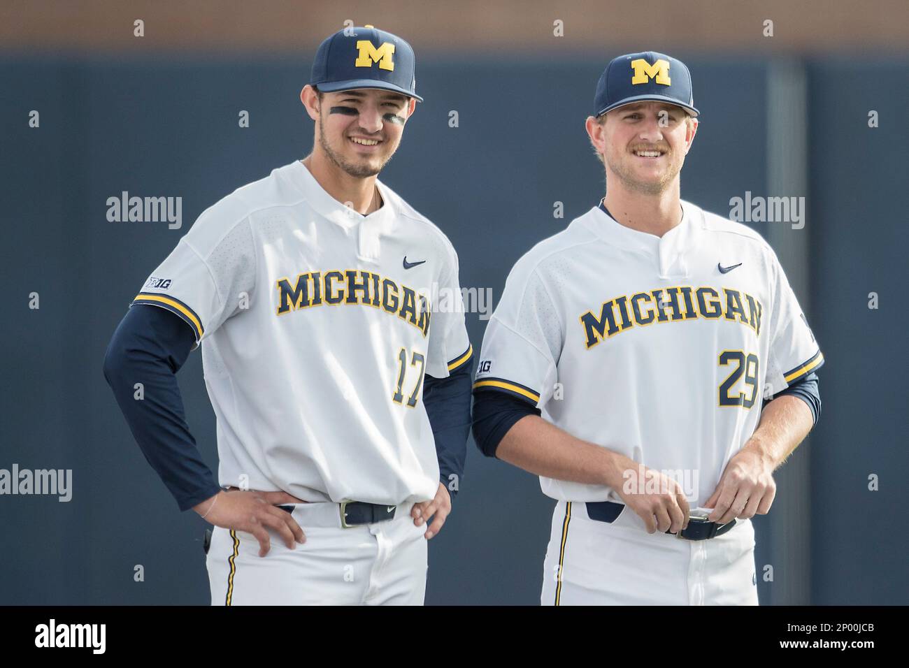Michigan Wolverines third baseman Drew Lugbauer (17) and pitcher Mac Lozer  (29) before the NCAA baseball game against the Michigan State Spartans on  April 18, 2017 at Ray Fisher Stadium in Ann
