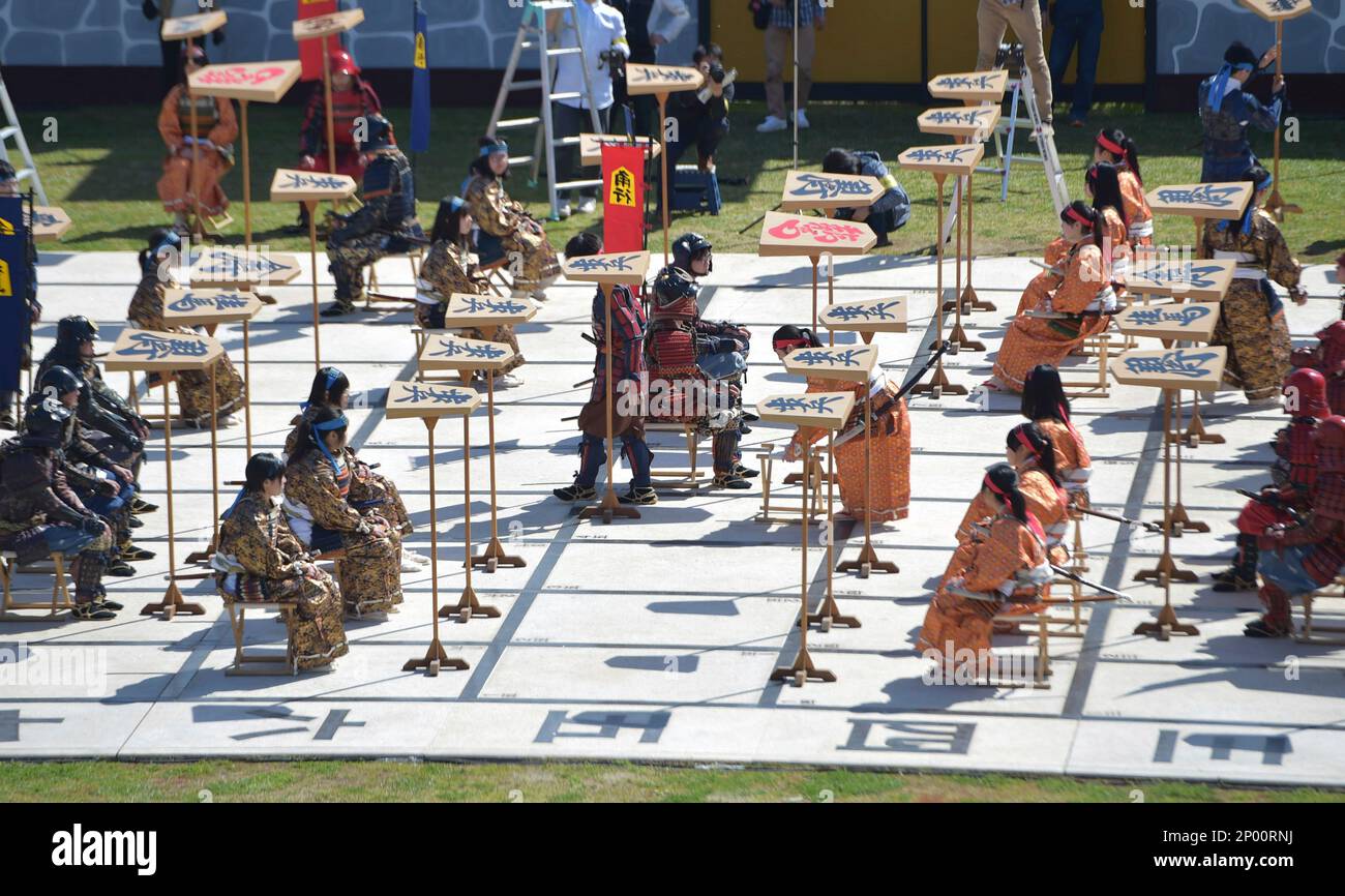 Local high school students perform Ningen Shogi, human Japanese chess on  top of Mt. Maizuru, in Tendo, Yamagata Prefecture on April 22, 2017. Tendo  is known for production of shogi koma,'' pieces