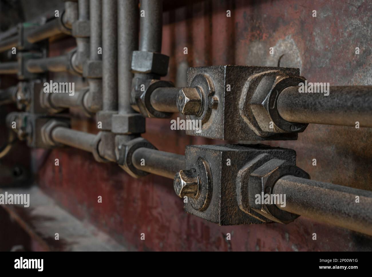 hydraulic pipes of a historic machine Stock Photo Alamy