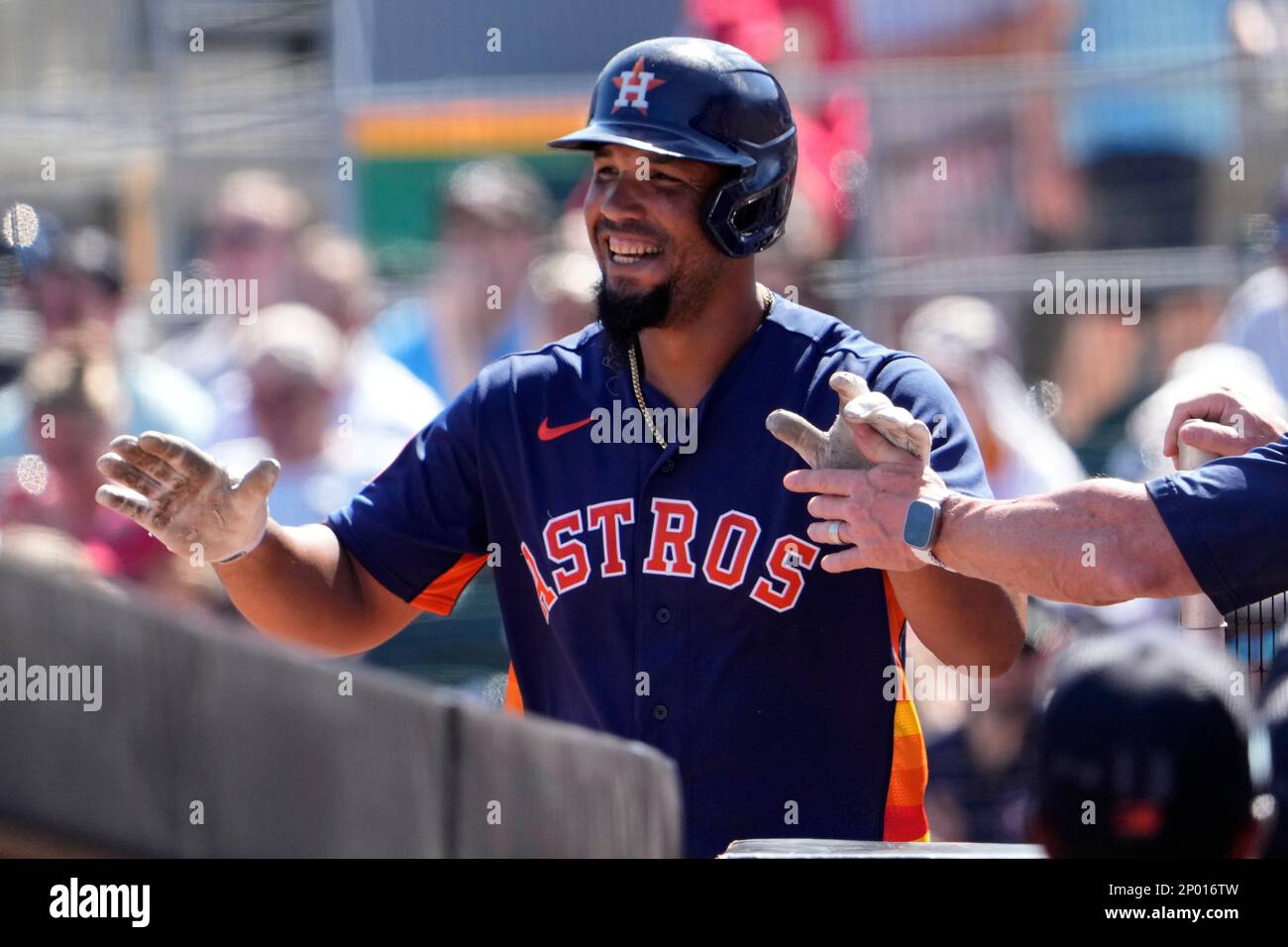 Houston Astros' Jose Abreu is congratulated by teammates after hitting a  solo home run during the third inning of a spring training baseball game  against the St. Louis Cardinals Thursday, March 2