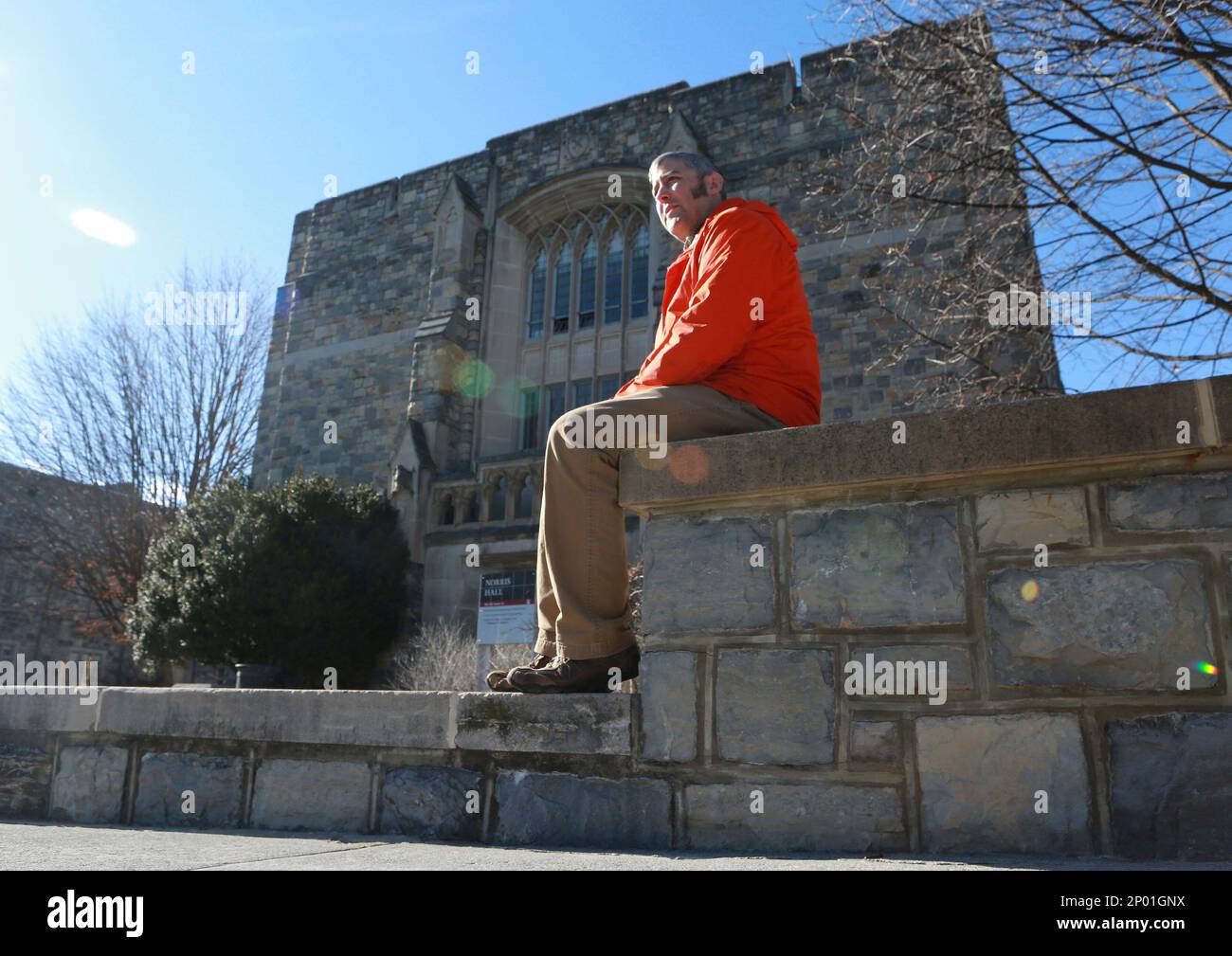 Kevin Sterne sits in front of Norris Hall on the Virginia Tech campus