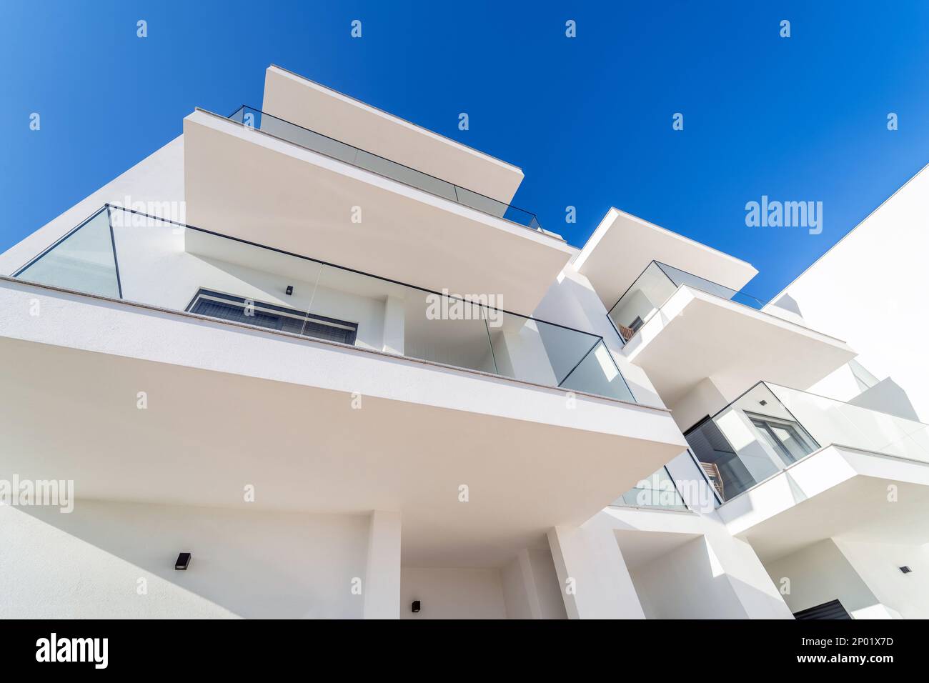 New modern apartment building with blue sky. Architecture facade of
