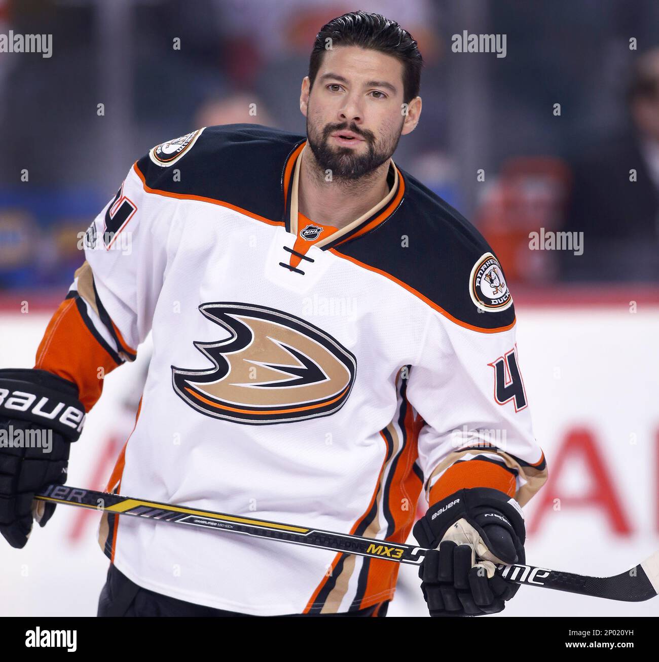 NHL profile photo on Anaheim Ducks player Nate Thompson at a game against the Calgary Flames in