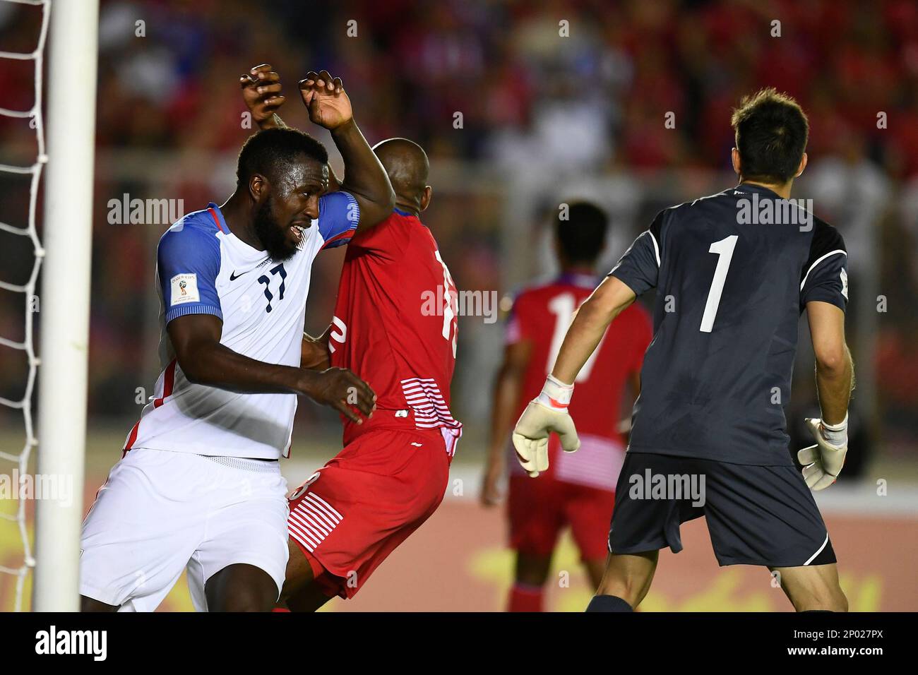 United States' forward Jozy Altidore (17) and defender Adolfo Machado (13) battles for position before a free kick during second half of a 2018 FIFA World Cup qualifying final round soccer match. Tuesday, March 28, 2017 in Panama City, Panama. United States' Panama draw 1-1. (TFV Media via AP Images) Stock Photo