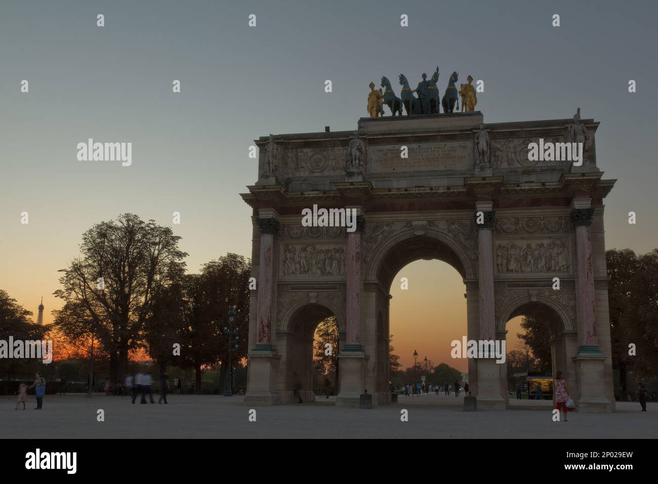 The Arc de Triomphe du Carrousel at sunset in Paris, France Stock Photo