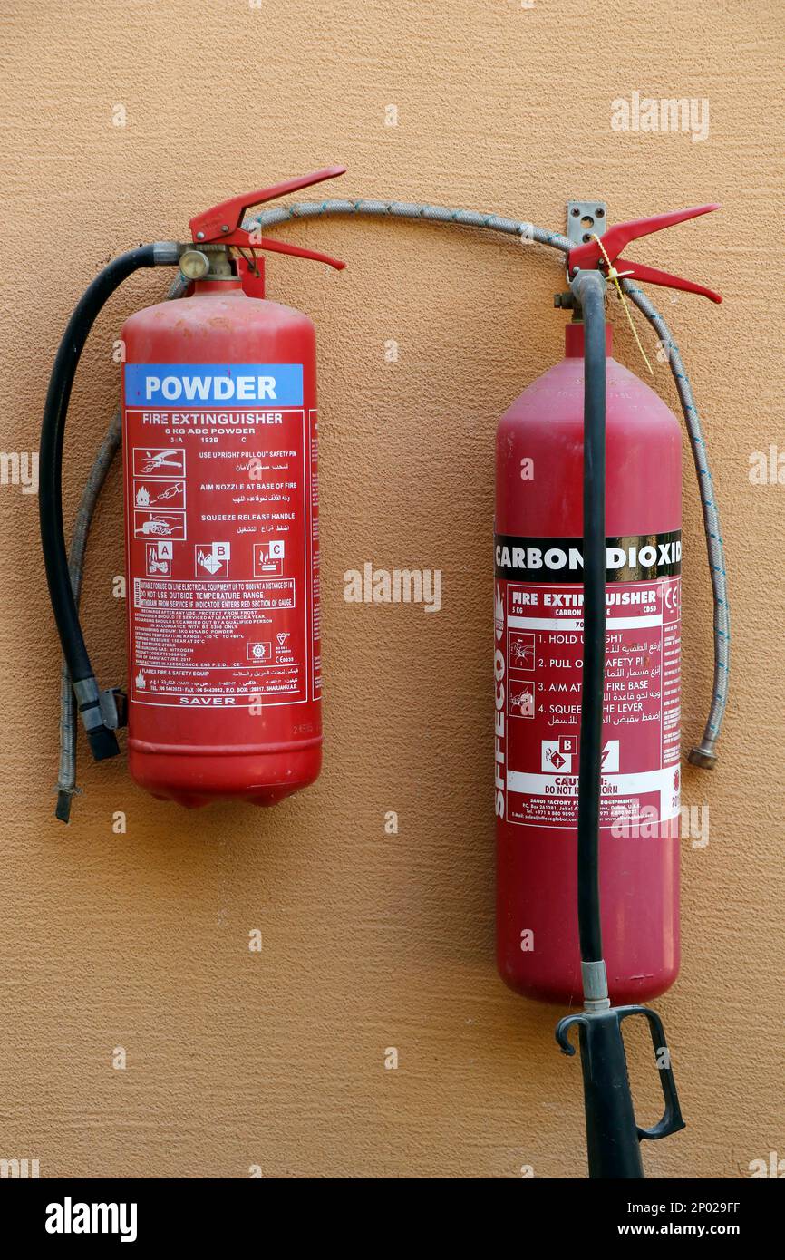 Dubai, United Arab Emirates - February 9, 2022 fire and safety equipment, emergency fire extinguisher usually fixed in kitchen and warehouses, buildin Stock Photo
