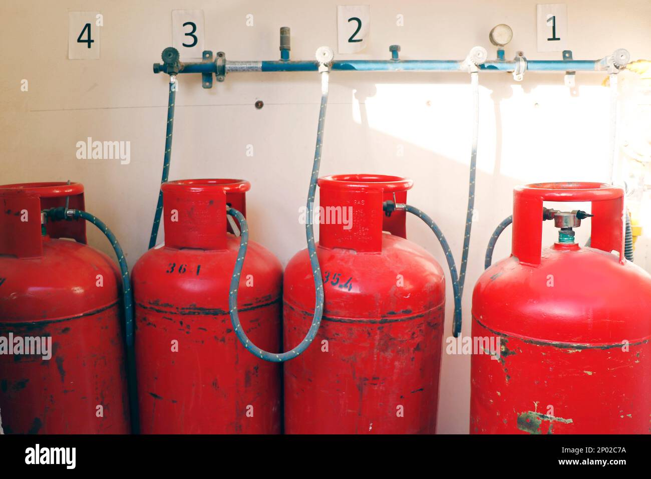 liquid petroleum gas (LPG) cylinders stored in a chamber Stock Photo