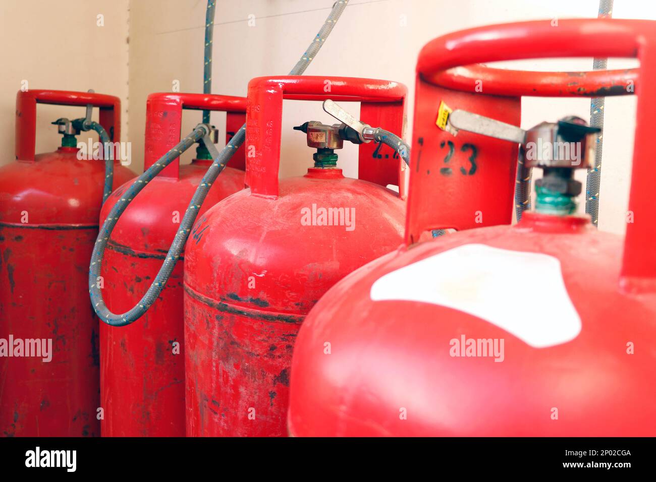 liquid petroleum gas (LPG) cylinders stored in a chamber Stock Photo