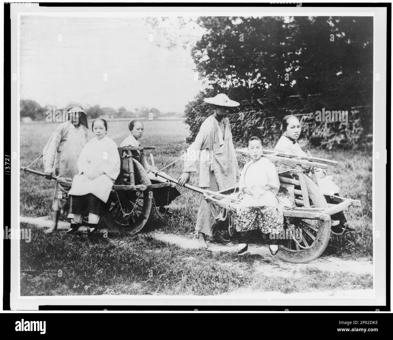 China. Passenger wheelbarrows. Frank and Frances Carpenter Collection