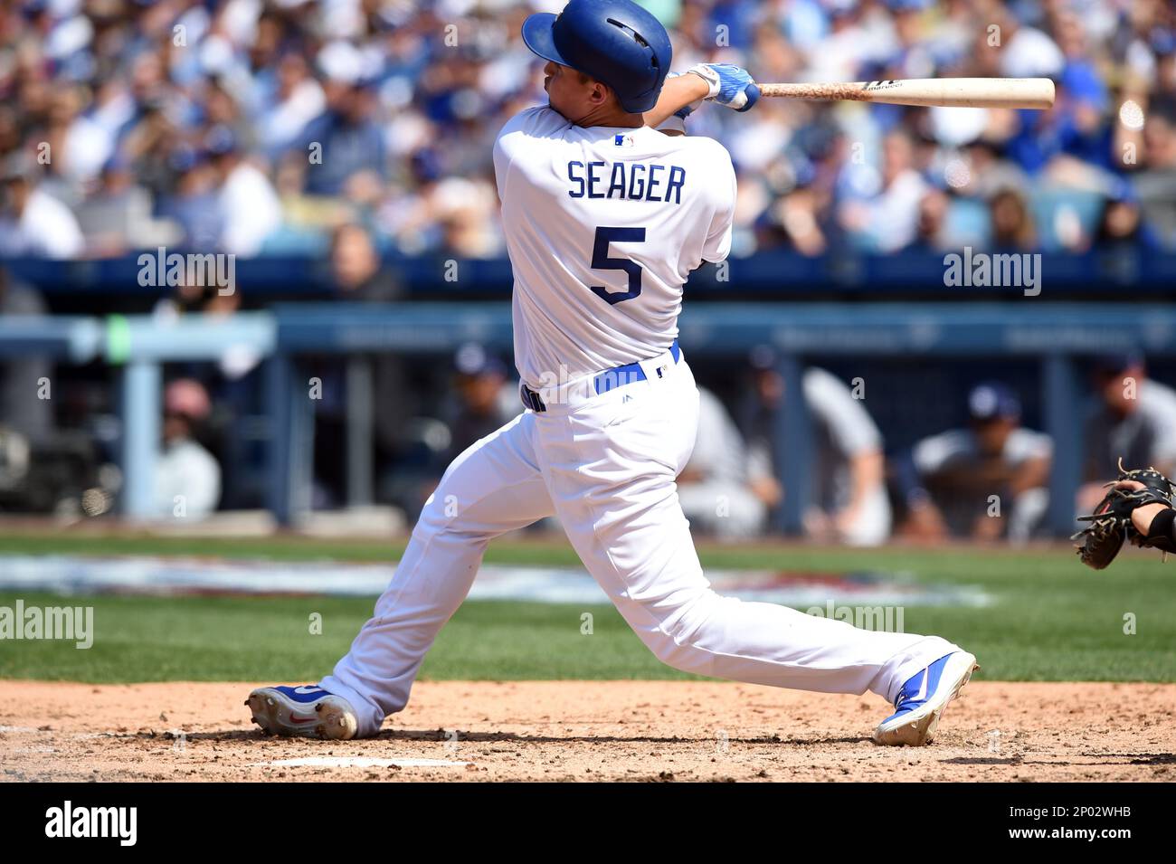 LOS ANGELES, CA - APRIL 03: Los Angeles Dodgers Shortstop Corey Seager (5)  hits a three run home run in the bottom of the 5th inning during an MLB  opening day game