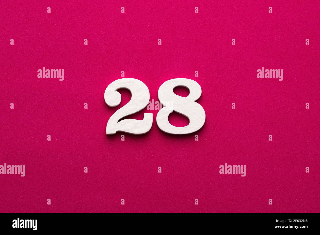 Number 28 - White wooden number on rhodamine red background Stock Photo ...