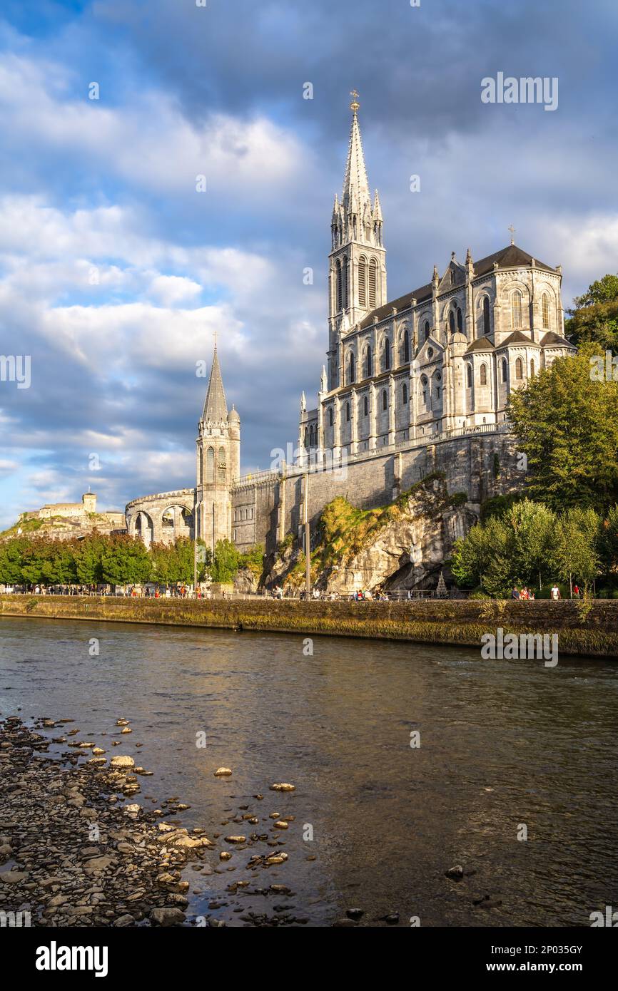Pilgrimage basilica of Holy Rosary above the grotto in Lourdes Stock Photo