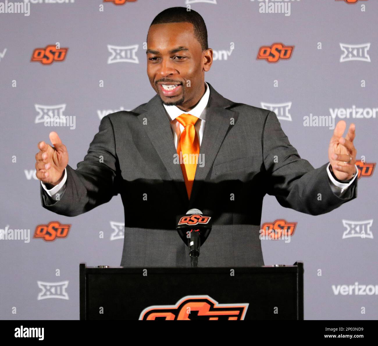 Oklahoma State's new head basketball coach Mike Boynton talks to