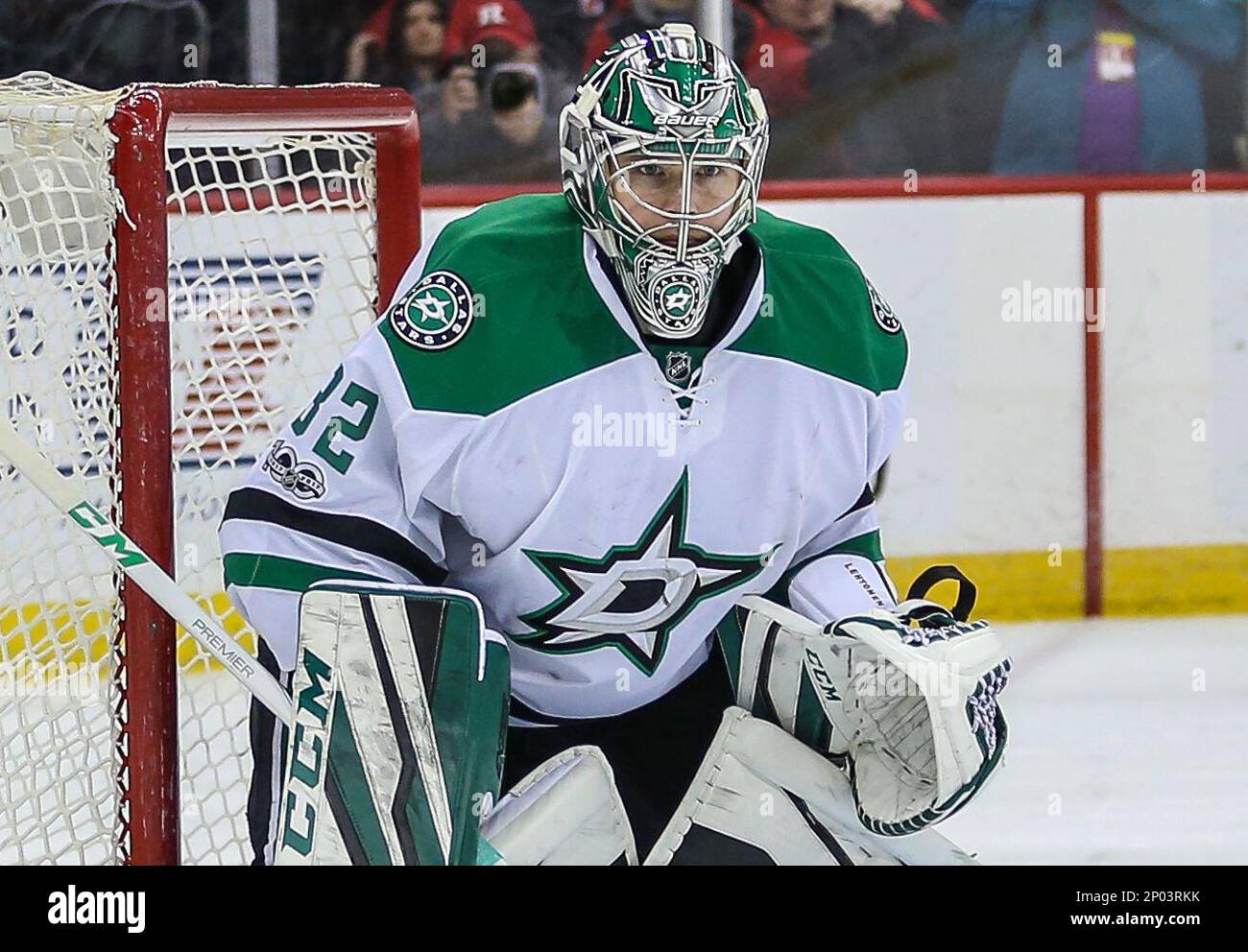 March 26, 2017: Dallas Stars goalie Kari Lehtonen (32) keeps his eye on the puck during the second period of an NHL game between the Dallas Stars and the New Jersey Devils at The Prudential Center in Newark, NJ. Dallas won in OT, 2-1. Mike Langish/Cal Sport Media. (Cal Sport Media via AP Images) Stock Photo