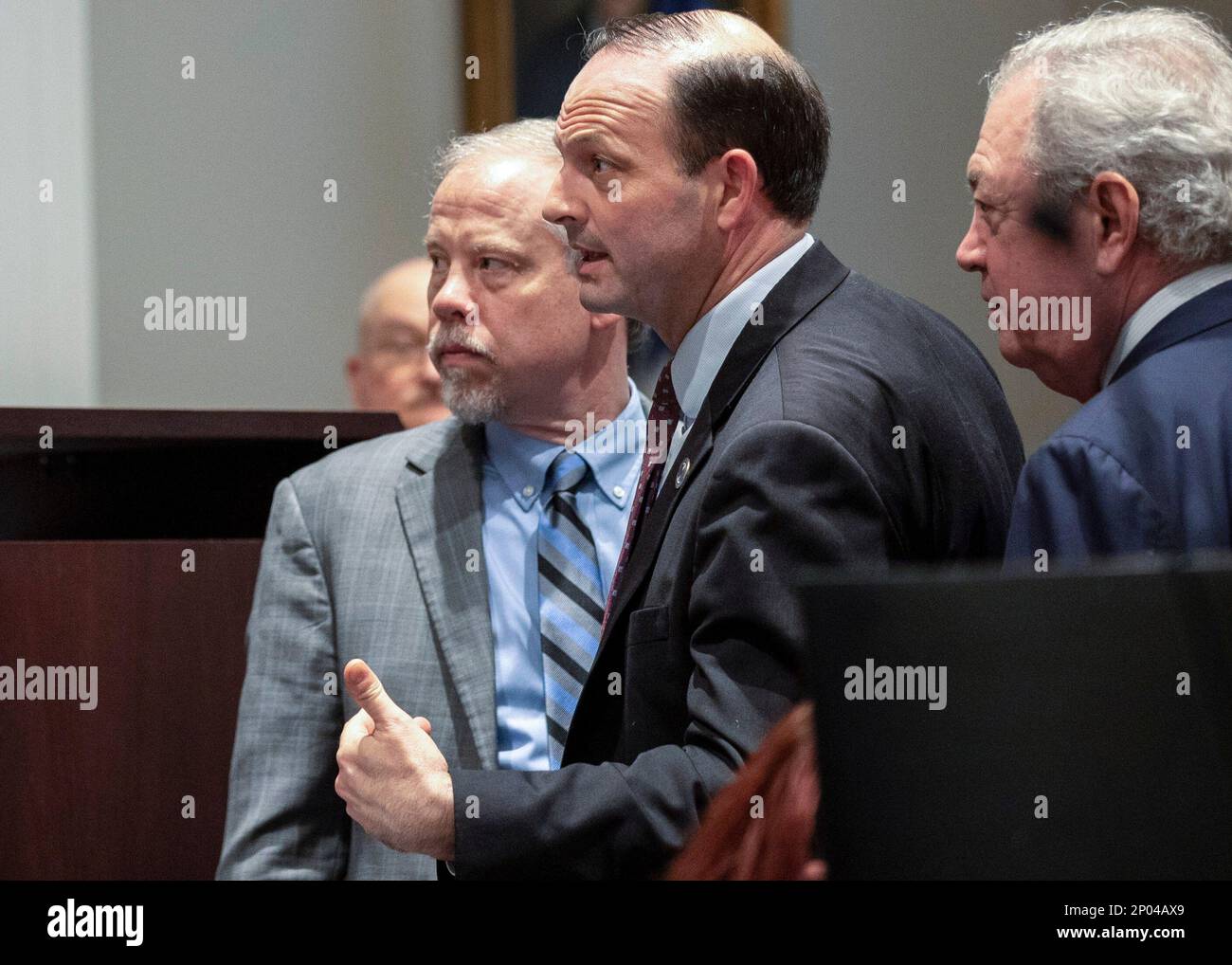 From left, Prosecutor Creighton Waters, attorney general Alan Wilson ...