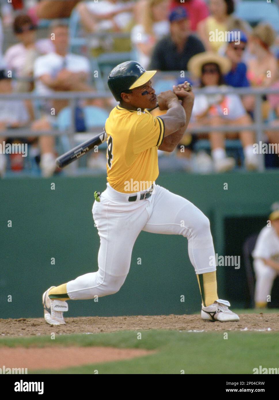 Oakland A's Rickey Henderson (24) during a game from his 1992 season with  the Oakland A's. Rickey Henderson played for 25 years with 9 different teams,  was a 10-time All-Star was inducted