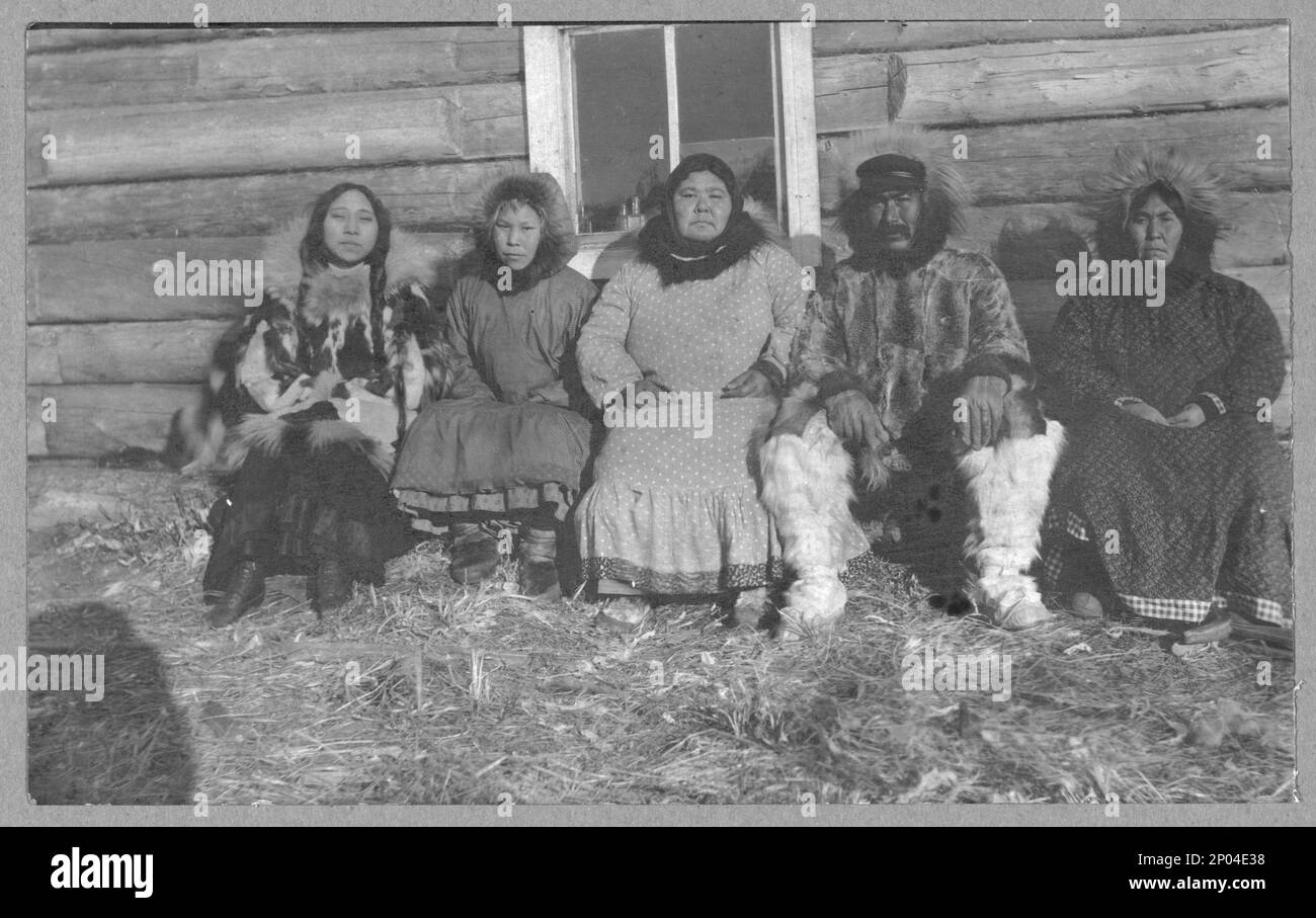 Reindeer Mary and her husband (and family?). Frank and Frances Carpenter collection , Gift; Mrs. W. Chapin Huntington; 1951, Eskimos,Alaska,1890-1940, Indians of North America,Alaska,1890-1940, Families,Alaska,1890-1940, United States,Alaska Stock Photo