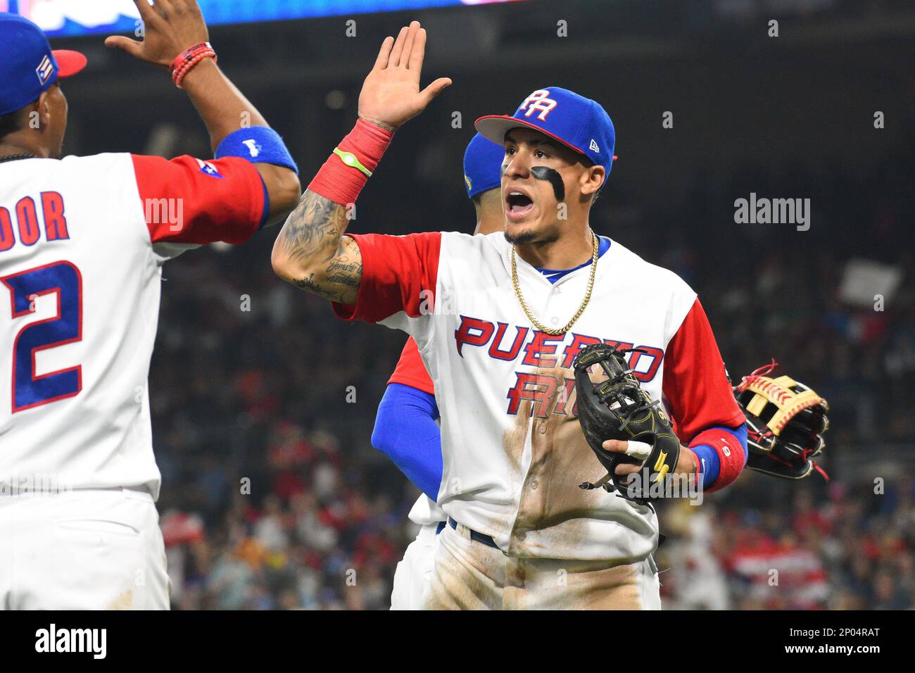 SAN DIEGO, CA - MARCH 17: Puerto Rico Second baseman Javier Baez gets high  fives after their 6-5 win over the USA in World Baseball Classic second  round Pool F game against