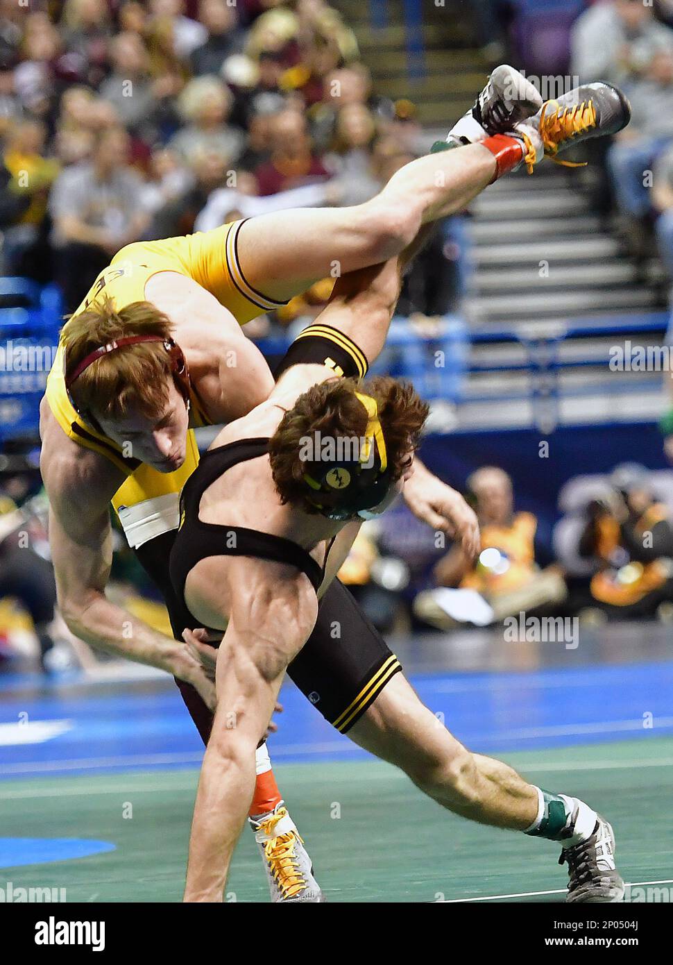 ST. LOUIS, MO. MARCH 16 Iowa's Thomas Gilman tries to get a reversal