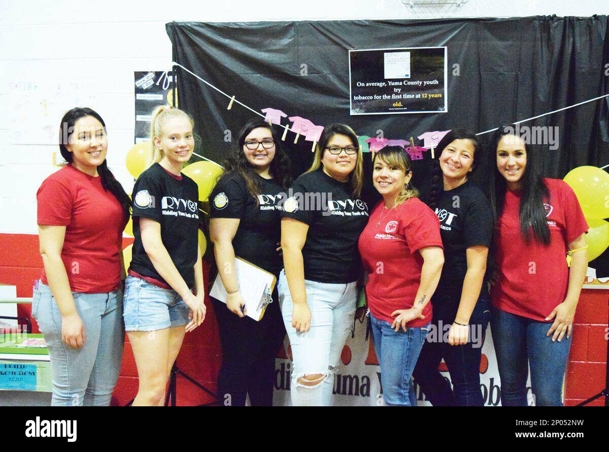 Members of the Ridding Yuma Youth of Tobacco Program as well as Health  educators pose for a group photo at the health fair, which took place at  Fourth Avenue Junior High. From