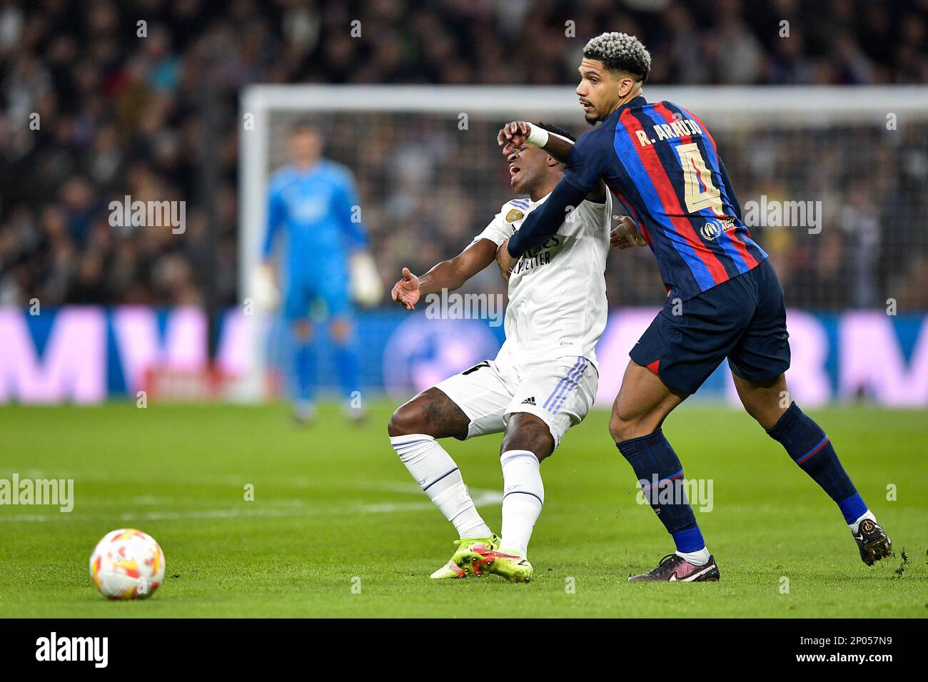 MADRID, SPAIN - MARCH 2: Ronald Araujo of FC Barcelona battles for the ball with Vinicius Junior of Real Madrid during the Semi Final Leg One - Copa Del Rey match between Real Madrid CF and FC Barcelona at the Estadio Santiago Bernabeu on March 2, 2023 in Madrid, Spain (Photo by Pablo Morano/BSR Agency) Stock Photo