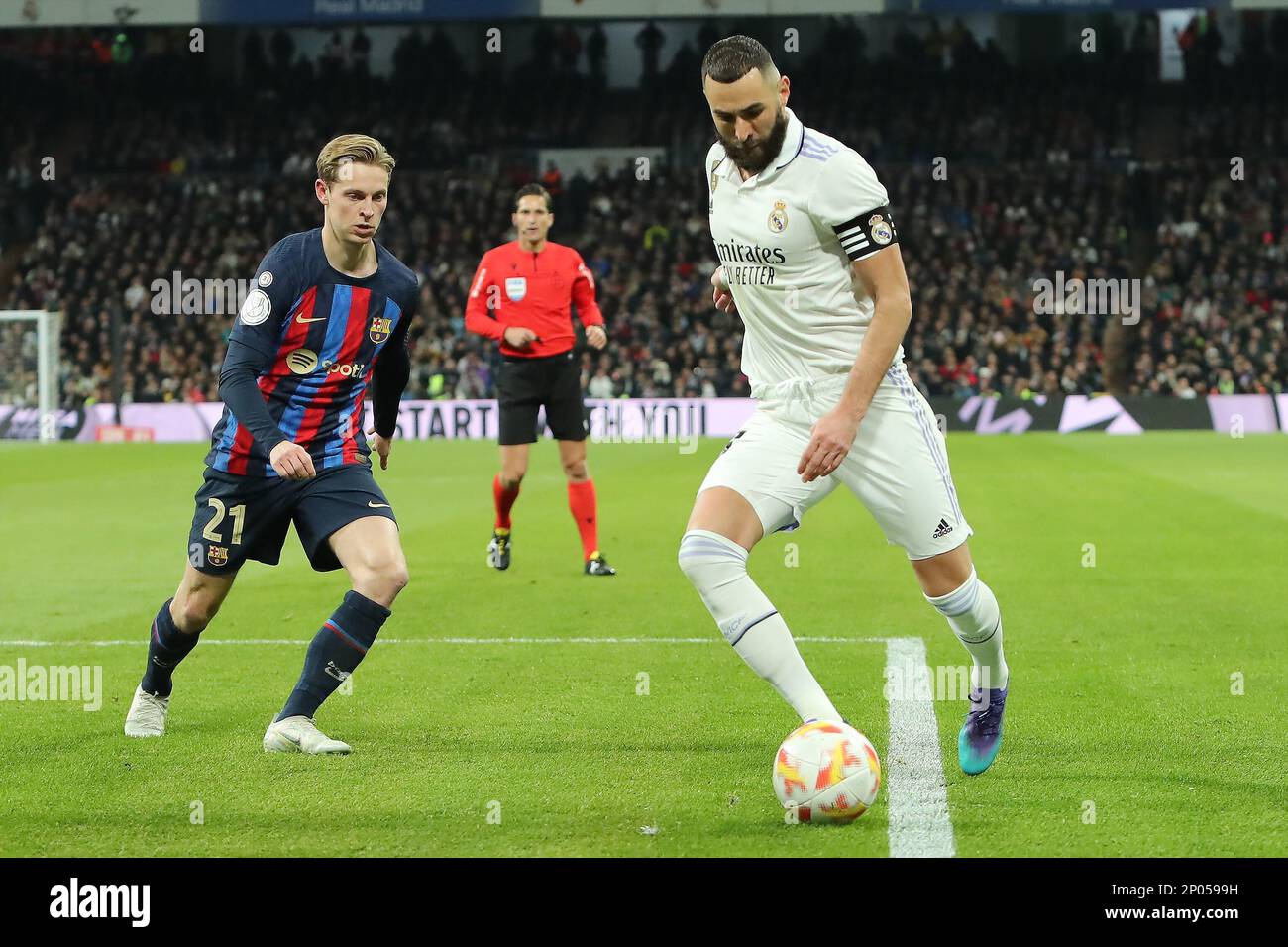 Madrid, Spain. 01st Mar, 2023. Real Madrid´s Karim Benzema (R) and Barcelona´s F.De Jong (L) in action during Copa del Rey Semifinal Match between Real Madrid and FC Barcelona at Santiago Bernabeu Stadium in Madrid, Spain, on March 2, 2023. (Photo by Edward F. Peters/Sipa USA) Credit: Sipa USA/Alamy Live News Stock Photo