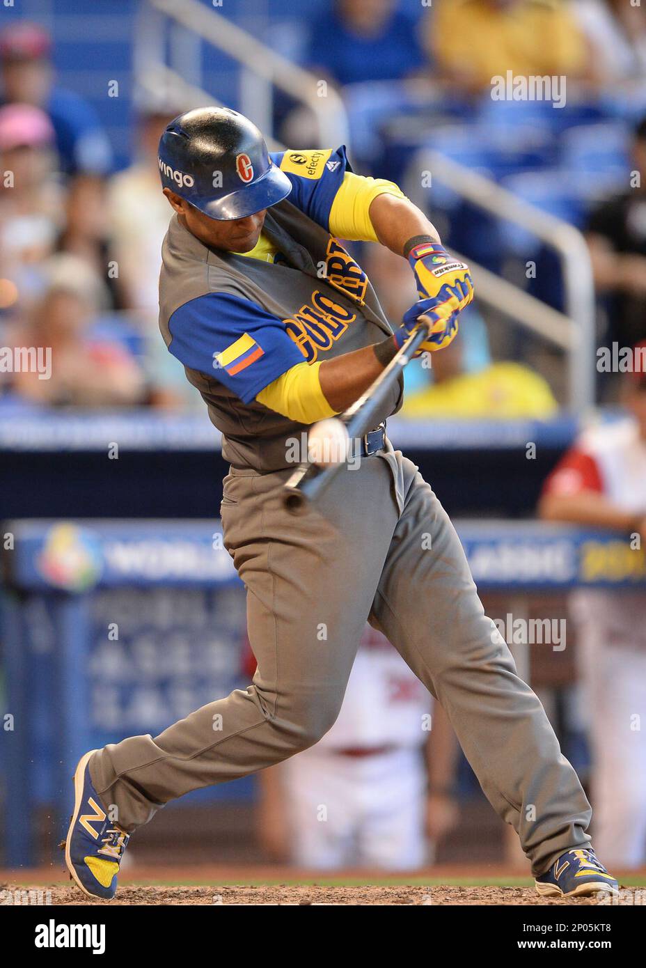 MIAMI, FL - MARCH 11: Colombia infielder Donovan Solano (17) singles on a  line drive to left field with 2 RBI during a game of the WBC between the  Canada and the