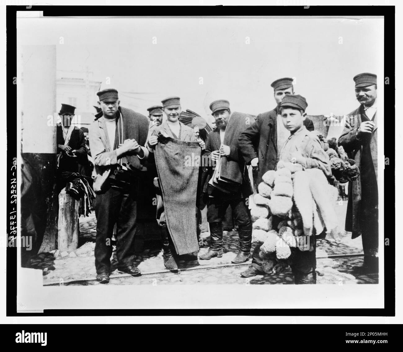 Bells for sale Clothing market.. Frank and Frances Carpenter Collection