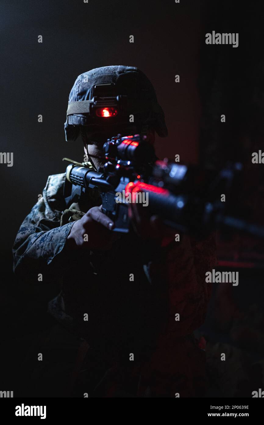 A U.S. Marine with III Marine Expeditionary Force Support Battalion ...