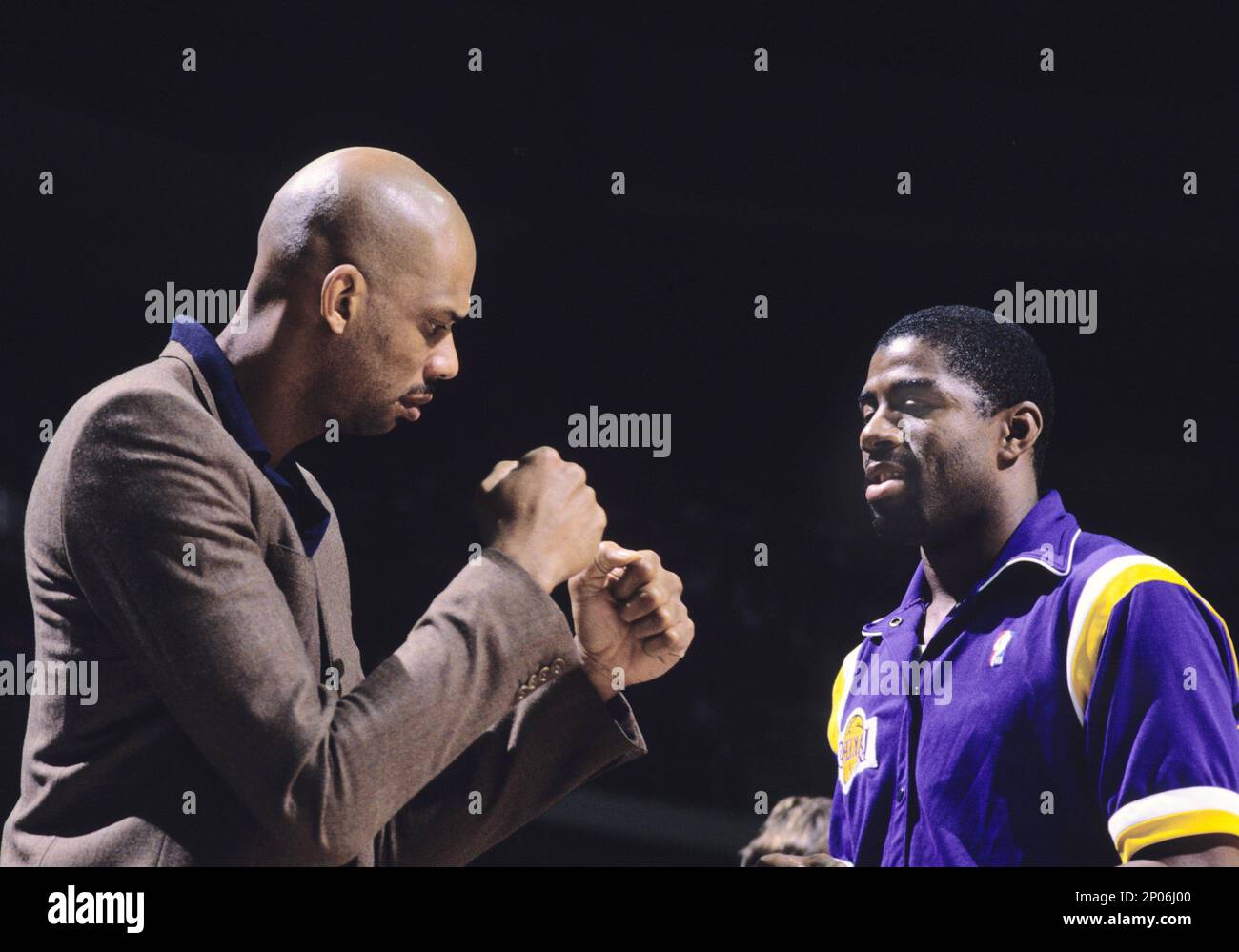 Guarding Magic Johnson Center Kareem Abdul-Jabbar and guard Magic Johnson of the Los Angeles ...