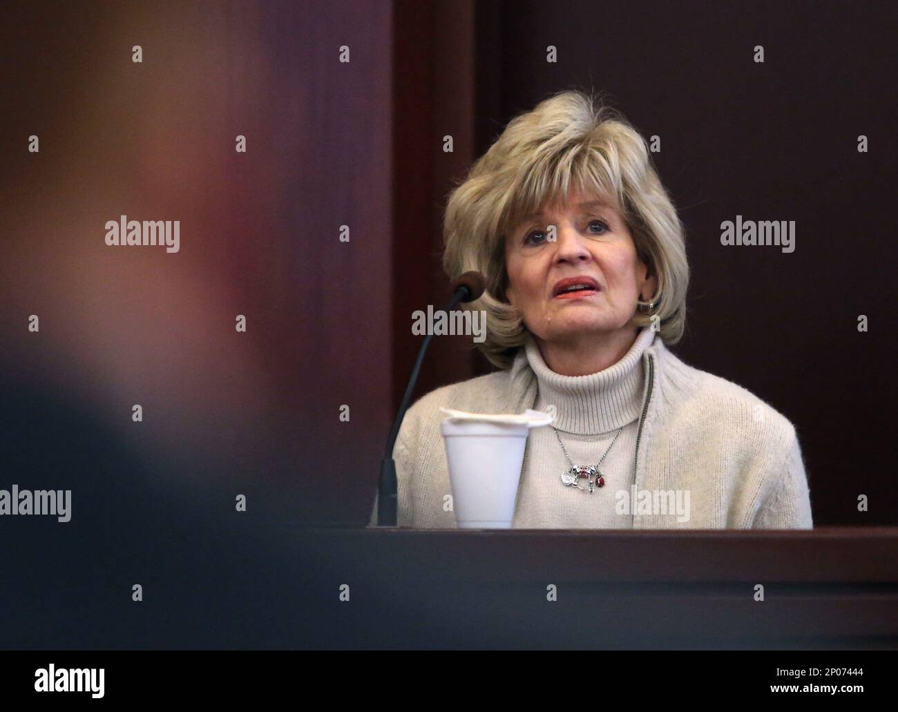 Marty Didriksen, mother of Cory Lovelace, testifies during the first