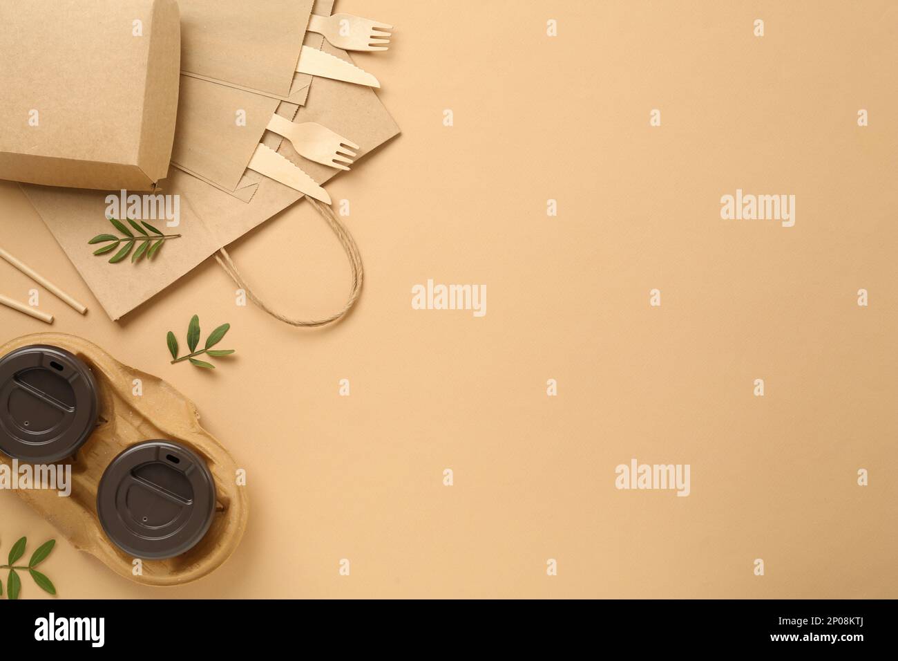 Flat lay of eco friendly products on beige background, space for text ...