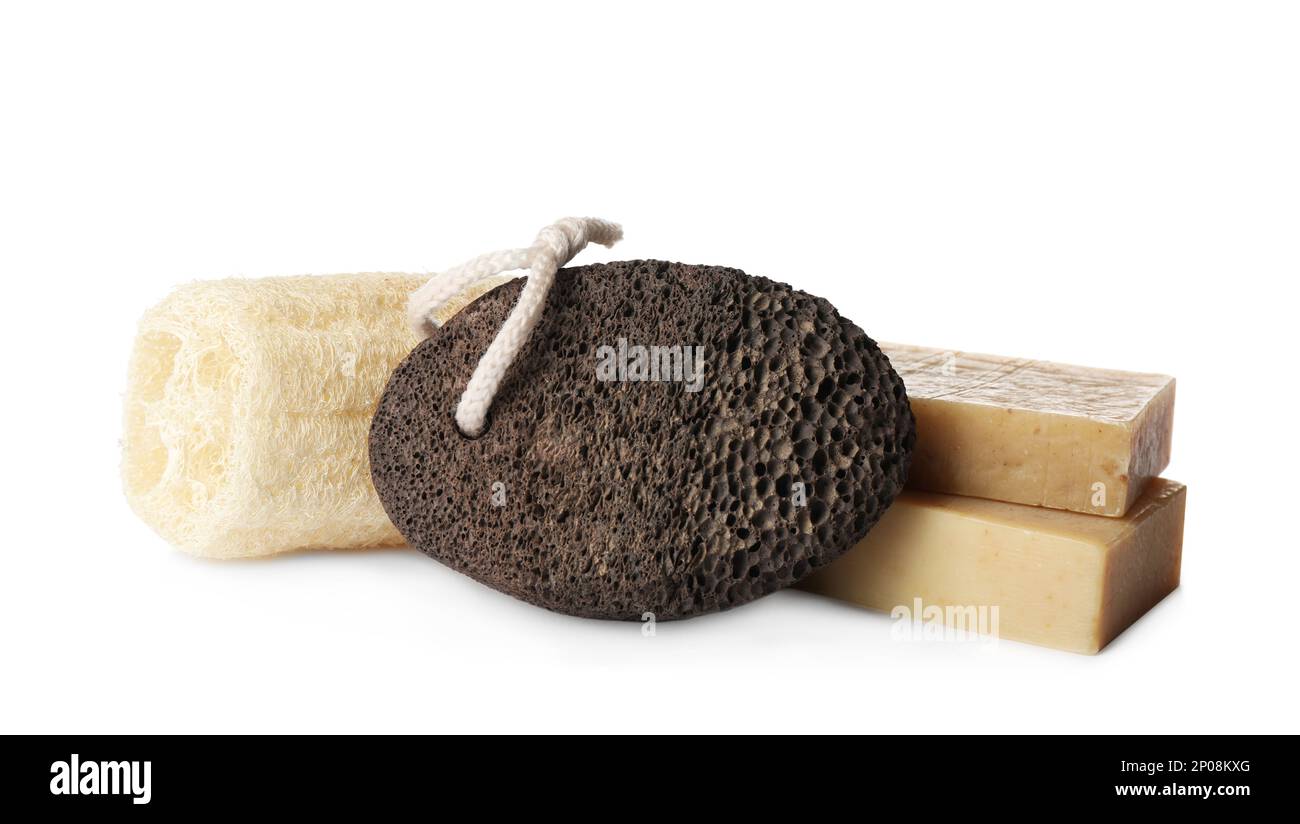 Pumice stone, soap bars and loofah on white background Stock Photo Alamy