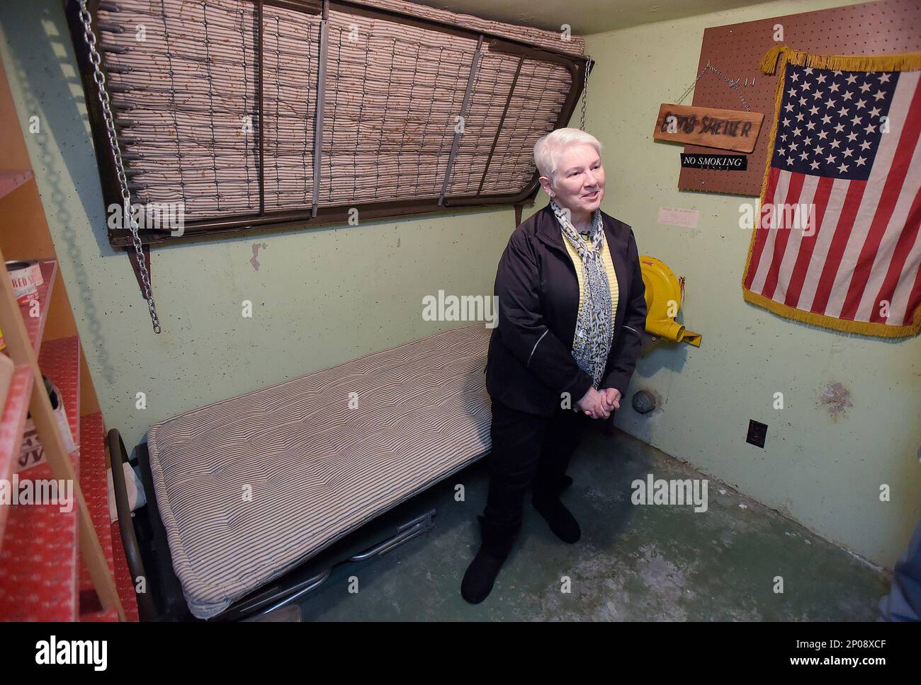 https://c8.alamy.com/comp/2P08XCF/advance-for-weekend-editions-feb-18-19-in-this-jan-31-2017-photo-marilyn-hill-stands-inside-the-fallout-shelter-in-the-backyard-of-her-albany-ore-home-the-10-foot-by-8-foot-shelter-was-designed-to-house-up-to-eight-people-the-walls-are-eight-inches-thick-the-shelter-was-built-by-a-previous-owner-in-1961-using-a-government-grant-andy-cripethe-corvallis-gazette-times-via-ap-2P08XCF.jpg