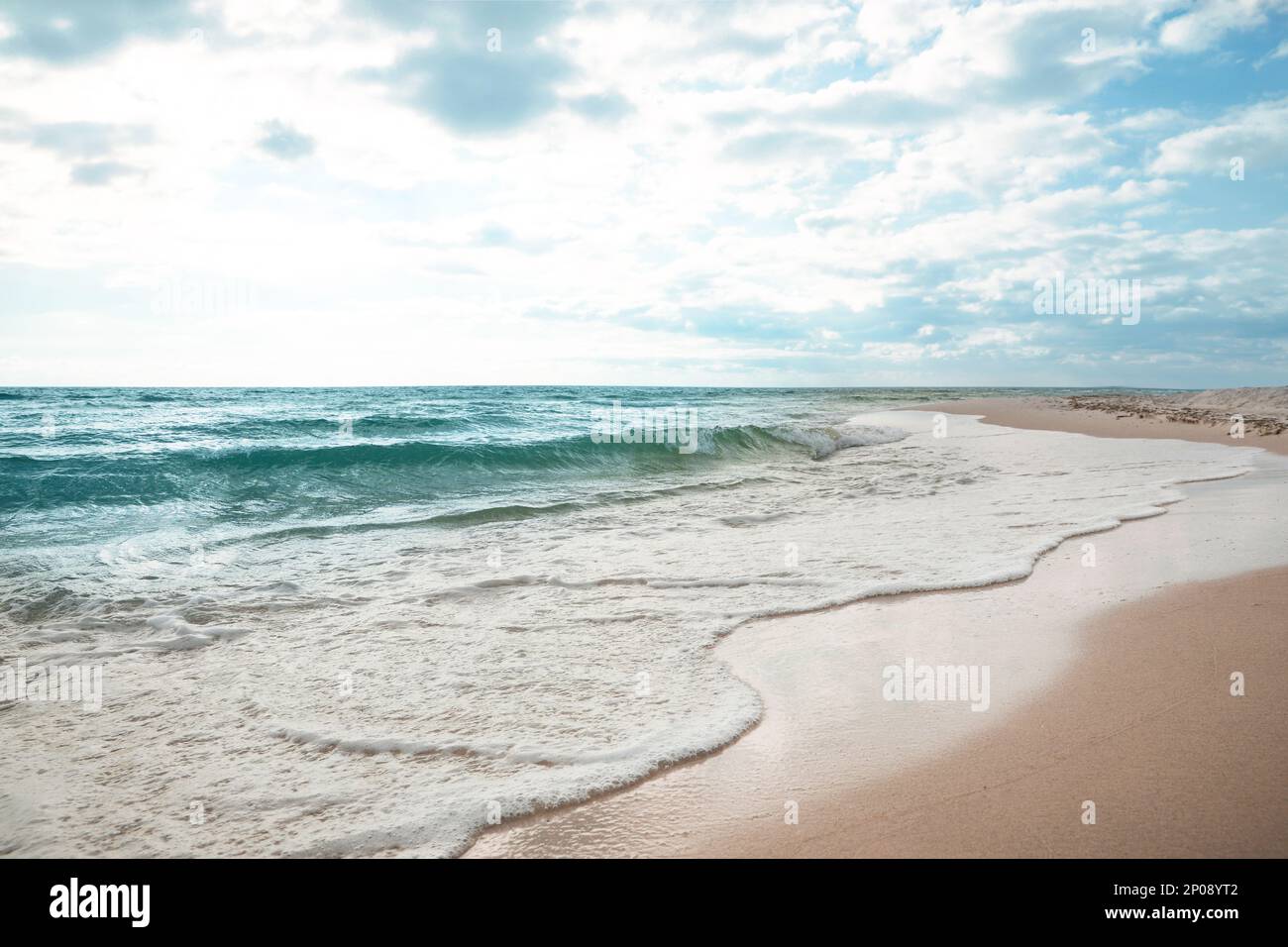 Blue waves rolling onto island hi-res stock photography and images - Alamy