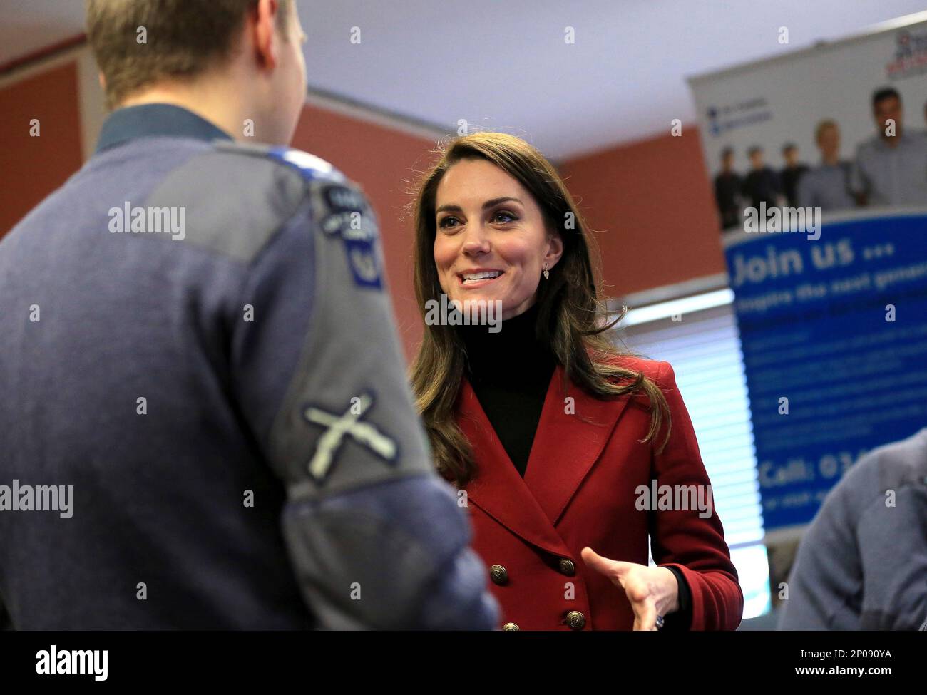 Britain's Kate, the Duchess Of Cambridge is shown a flight simulator as ...