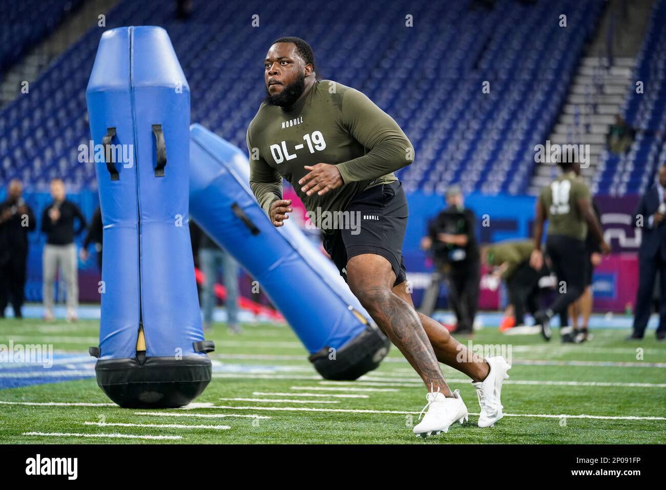 Mississippi State defensive lineman Cameron Young runs a drill at the NFL  football scouting combine in Indianapolis, Thursday, March 2, 2023. (AP  Photo/Michael Conroy Stock Photo - Alamy