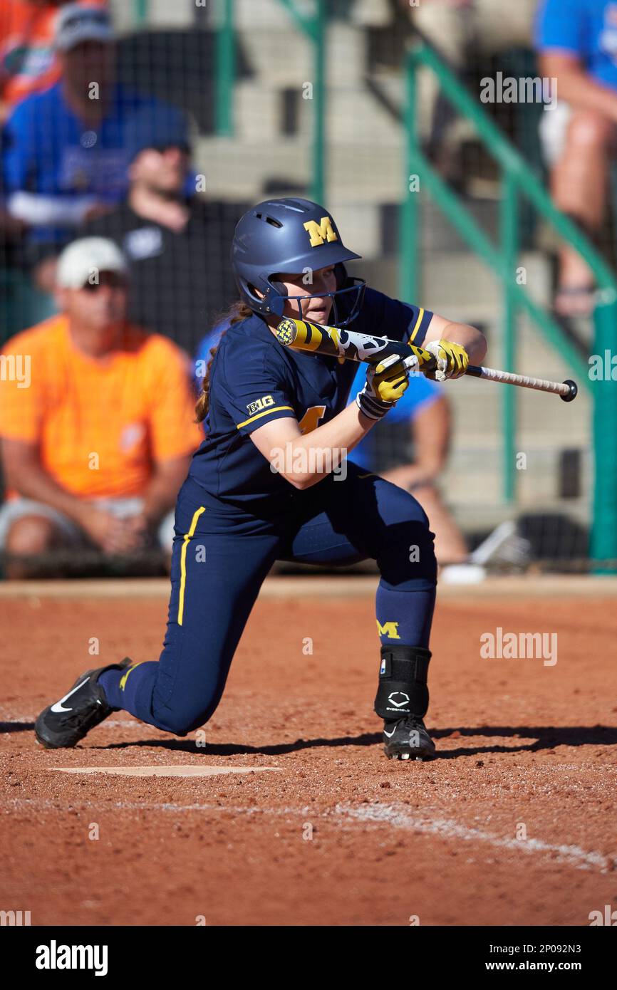 Michigan Wolverines Courtney Richardson (19) squares to bunt during a