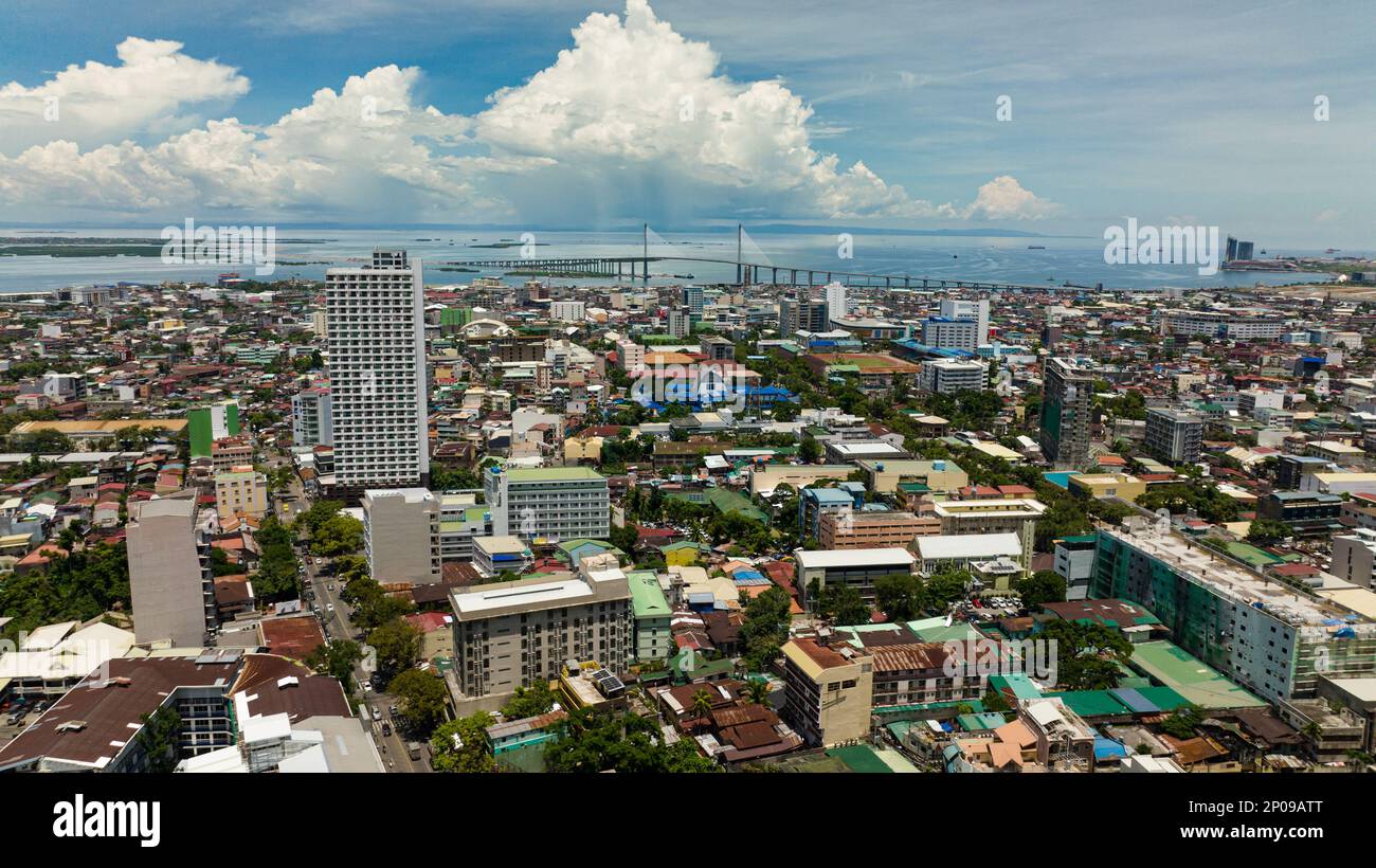 Panorama of Cebu city with tall buildings. Cebu Cordova Link Expressway ...