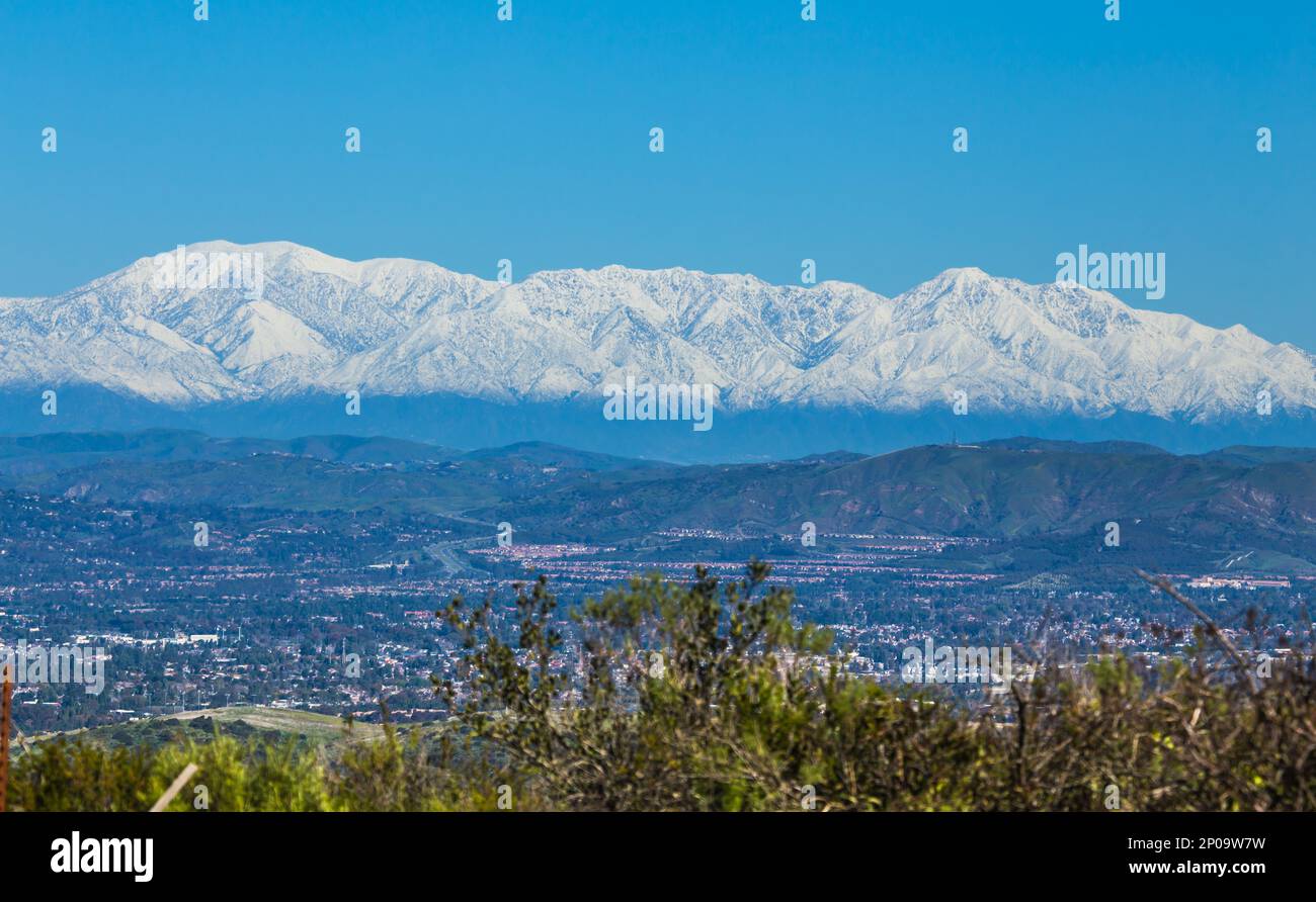 Snow capped San Gabriel Mountains in Los Angeles county after a huge storm blew through Southern California dumping record amounts of snow. Stock Photo
