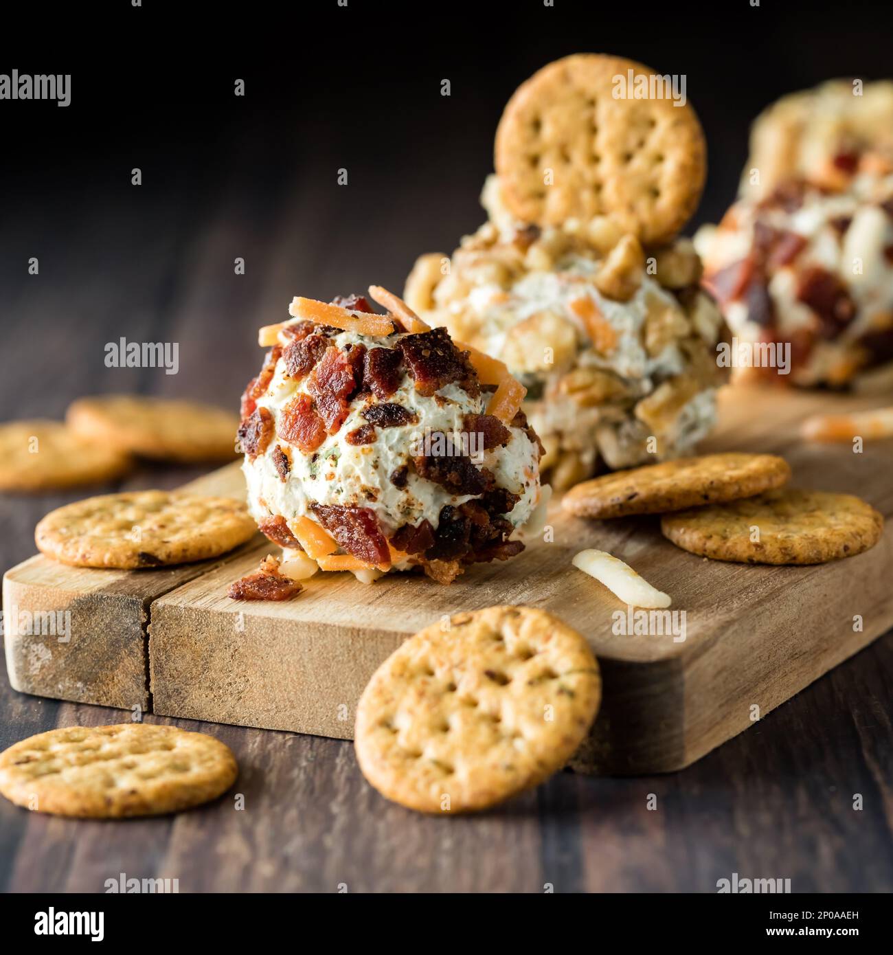 A dill pickle cream cheese fat bomb served with crispy crackers Stock