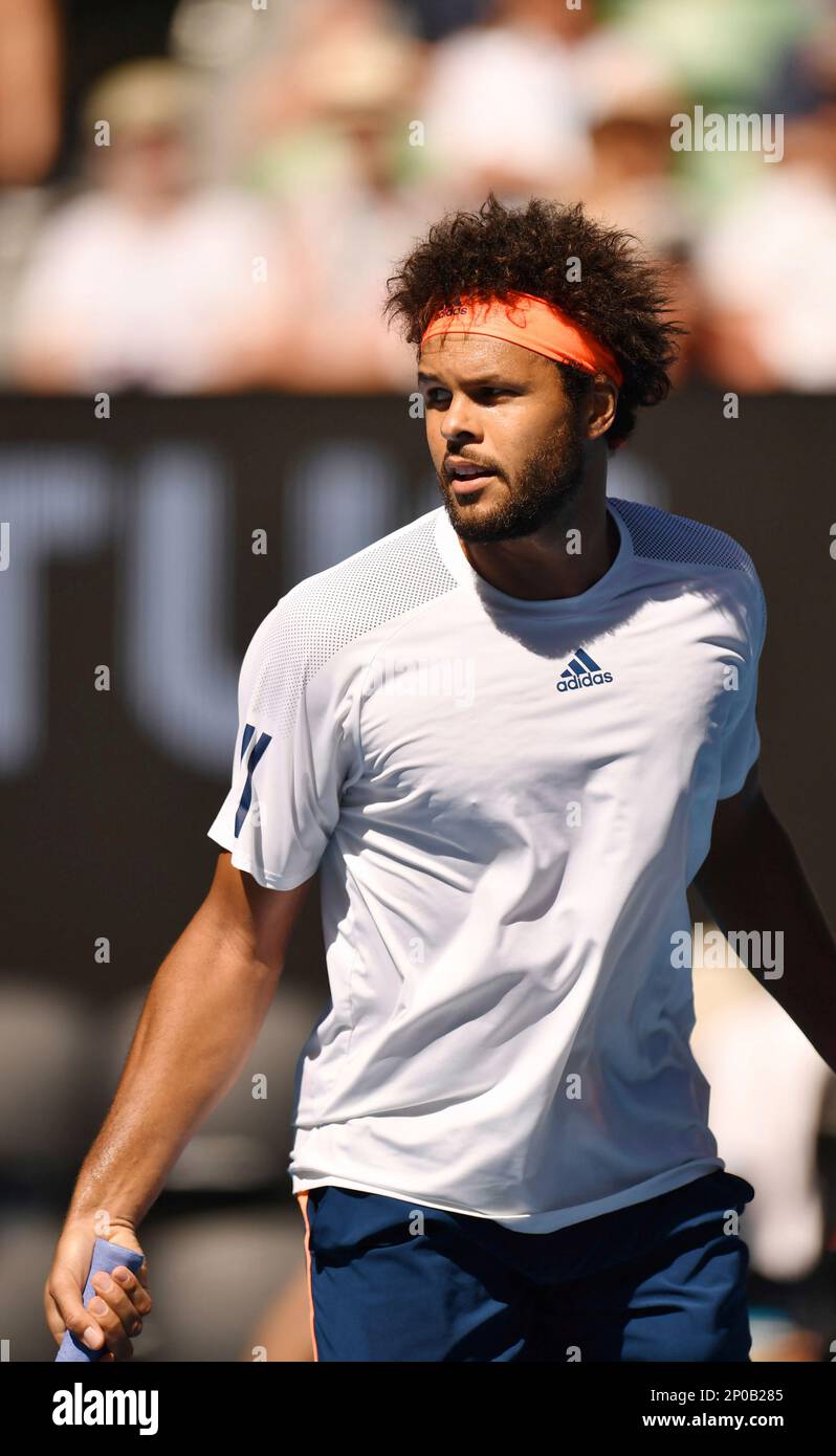 Jo-Wilfried Tsonga of France is vexed at losing a point against Stan  Wawrinka of Switzerland during his quarterfinals against Stan Wawrinka of  Switzerland at the Australian Open tennis tournament in Melbourne, Australia