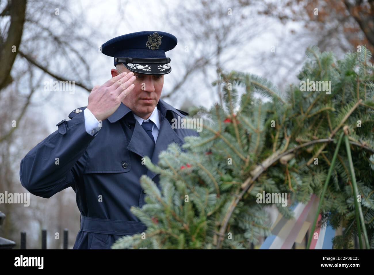 Col Thomas Griffin, 107th Attack Wing Operations Group Commander, lays the Presidential Wreath on Millard Fillmore grave, Buffalo NY, Jan 6 2023. A wreath from the current president is placed on the graves of former presidents on their birthdays by members of the U.S. military; the 107th has represented the president in honoring Fillmore for more than three decades. Air National Guard photo by 1st Lt Jason Carr. Stock Photo