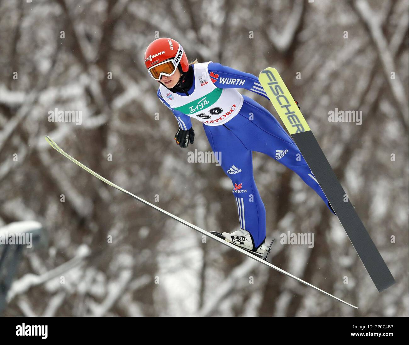 Katharina Althaus of Germany jumps during the women's ski jumping World Cup  in Sapporo, northern Japan, Sunday, Jan. 15, 2017. Maren Lundby of Norway  won the event with a total of 248.5