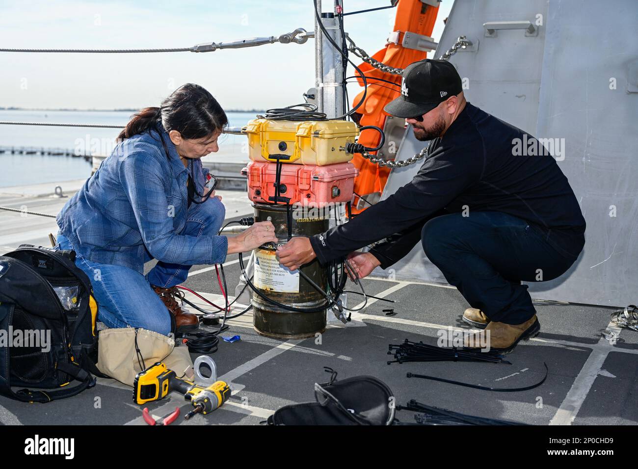 Transponder Lab Lead Alma Holt, left, and Electrical Technician Marc Anthony Carrillo, both of